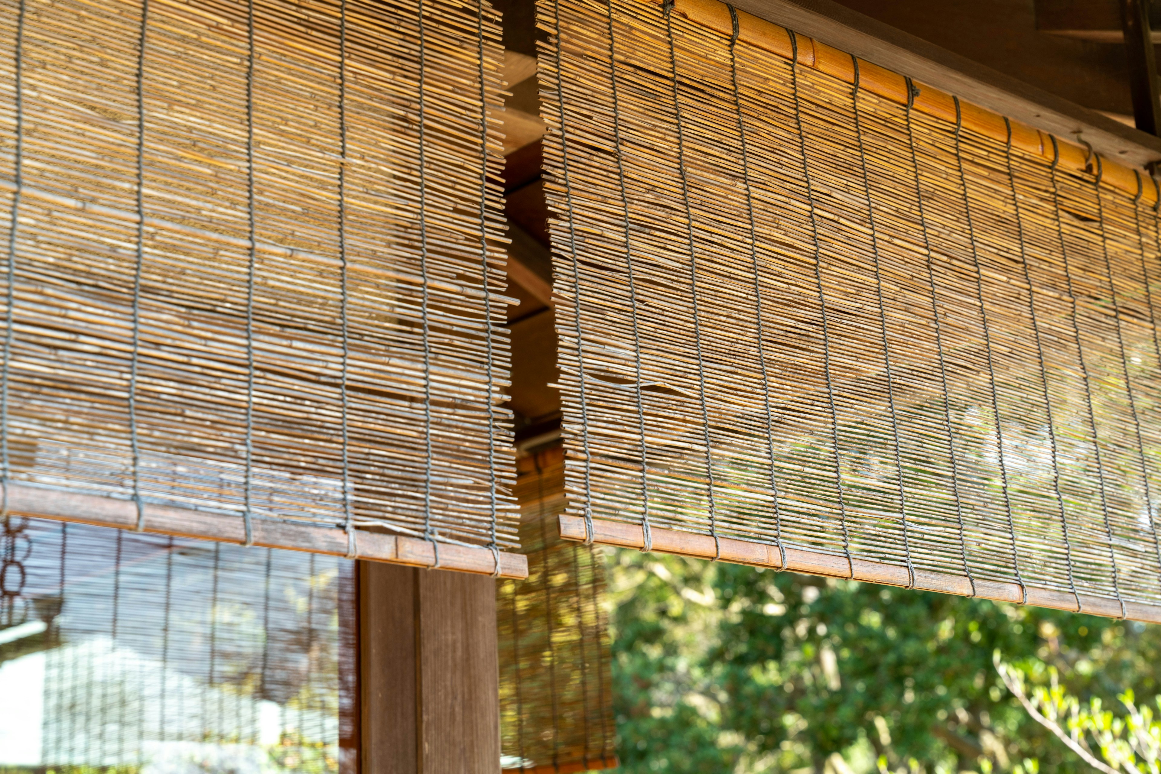 Detail of bamboo blinds allowing natural light to filter through