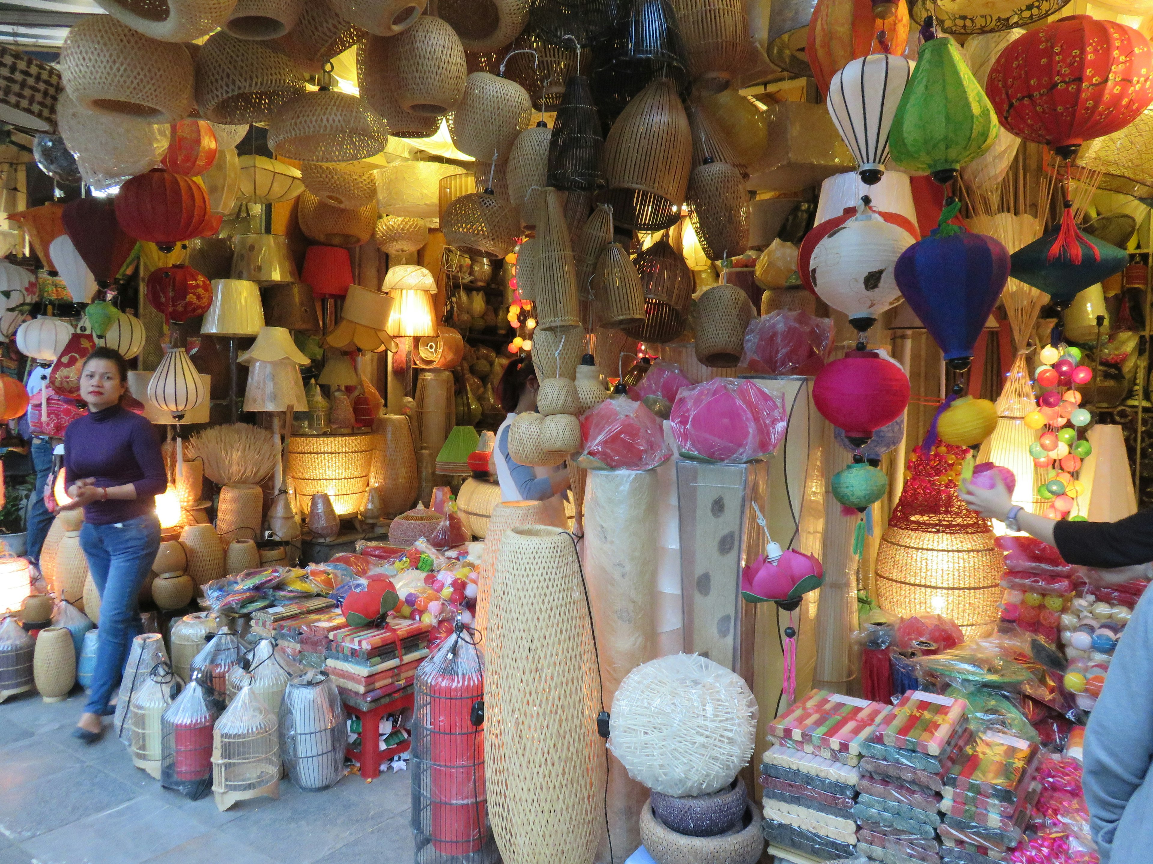 Vibrant market scene filled with colorful lamps and decorative items