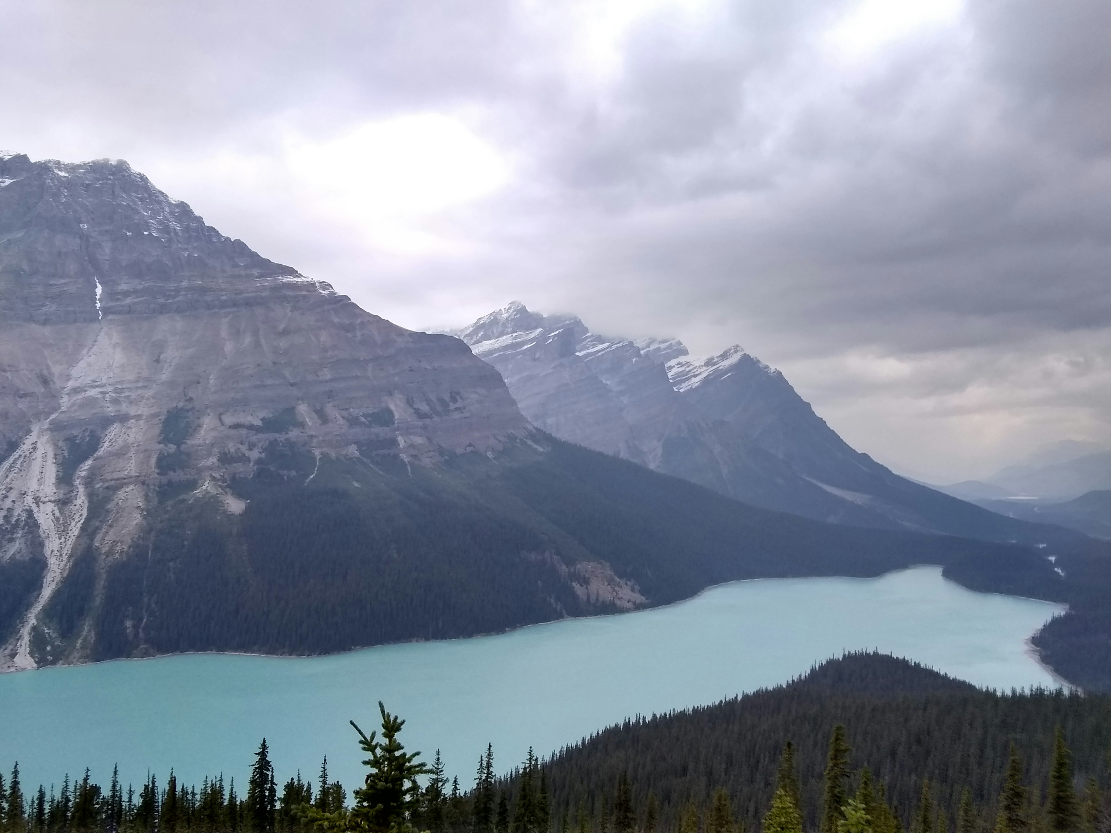 Scenic view of a glacial lake surrounded by mountains