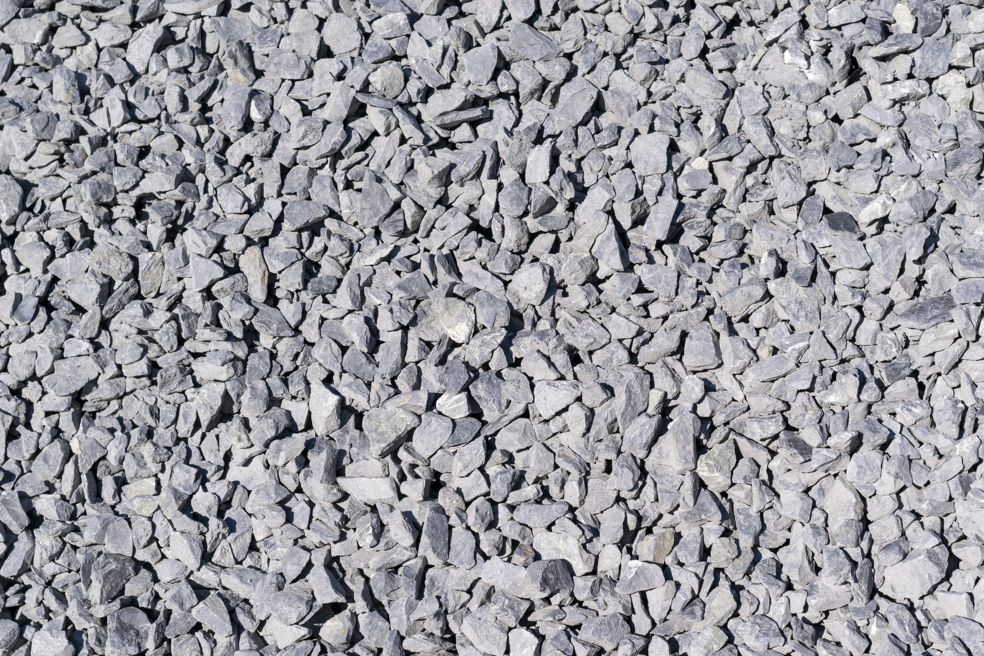 Surface of gray crushed stone