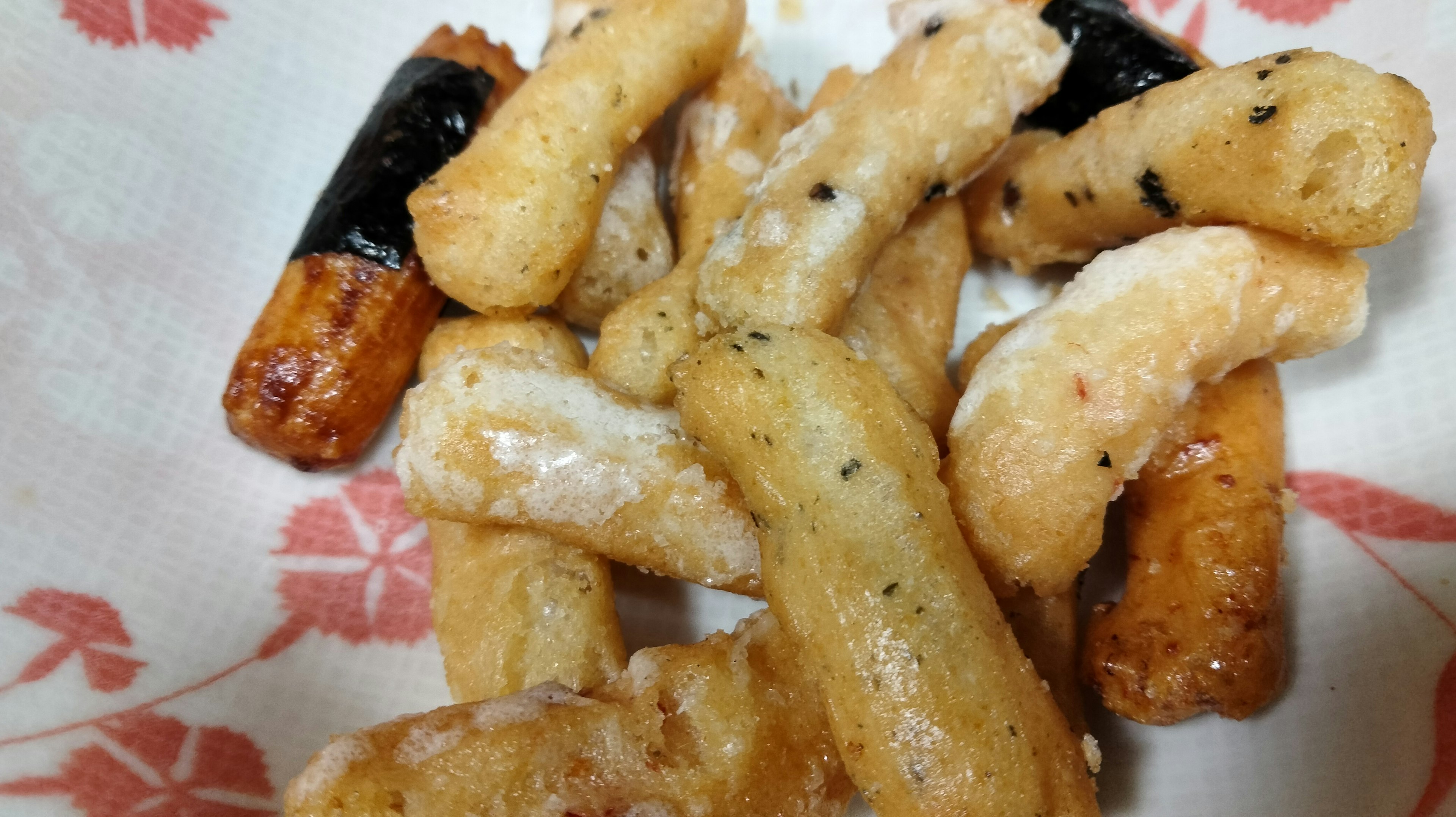 A variety of fried snacks with different shapes and colors