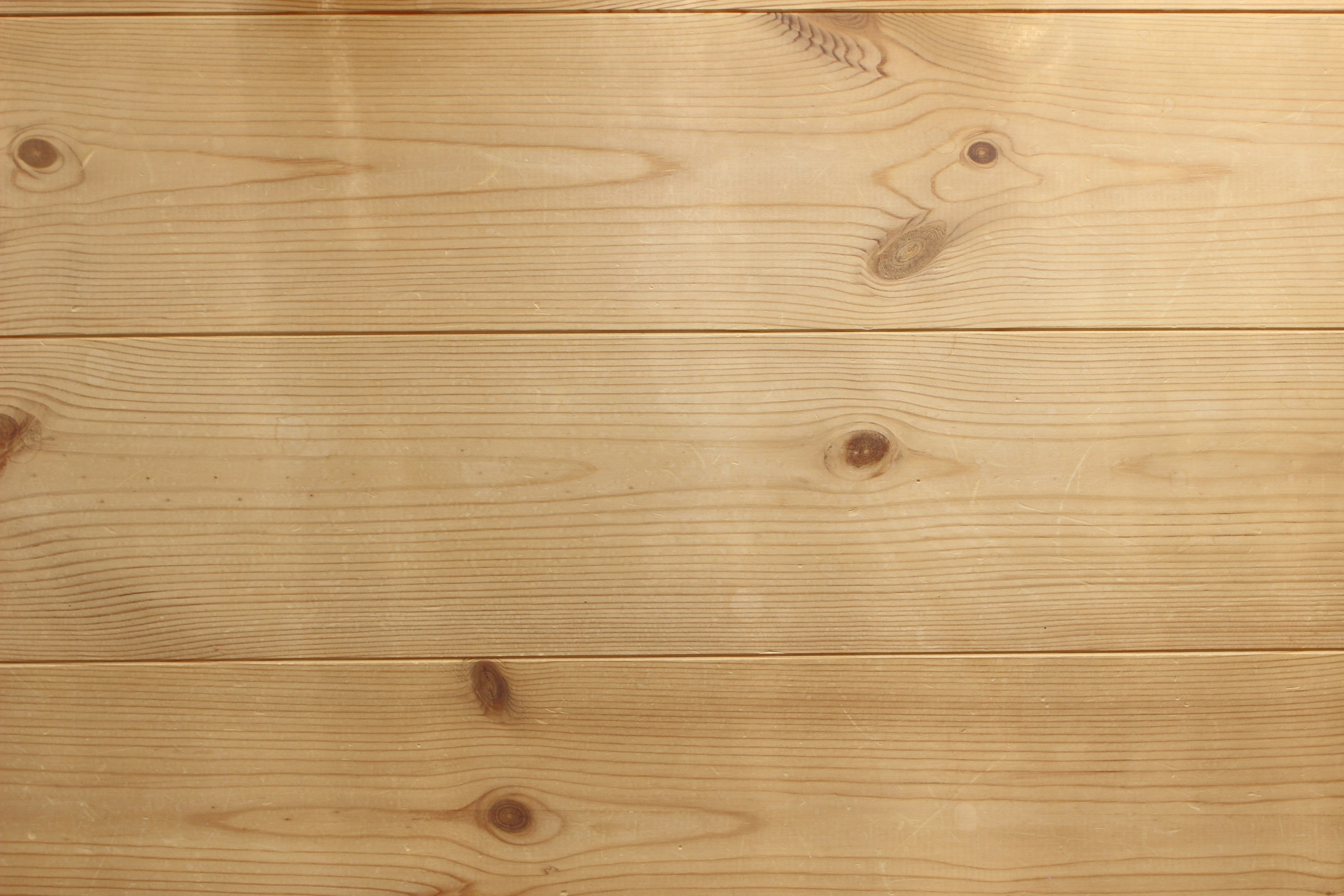 Wooden floor texture with natural grain and knots