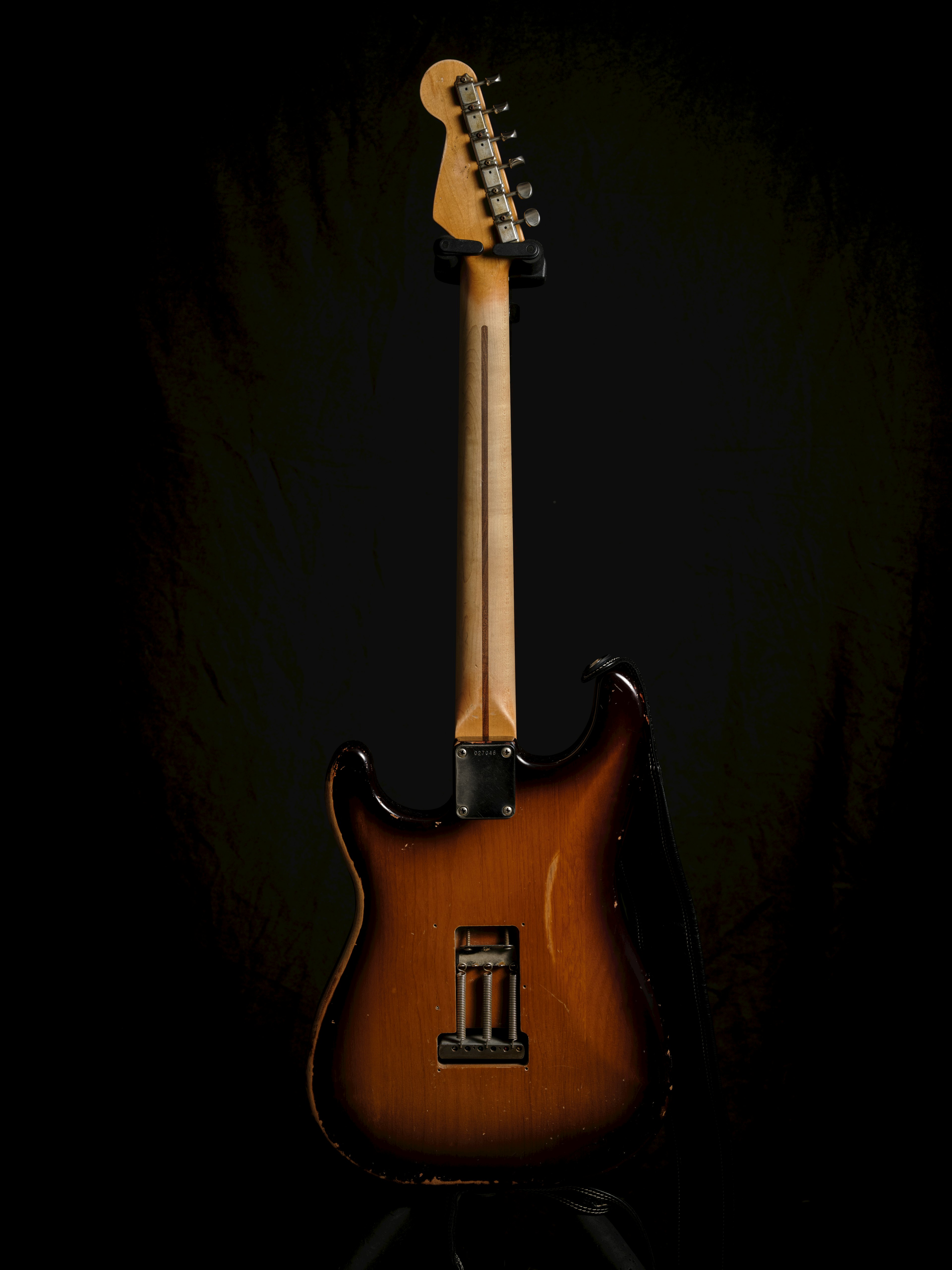 Rear view of a beautiful sunburst electric guitar