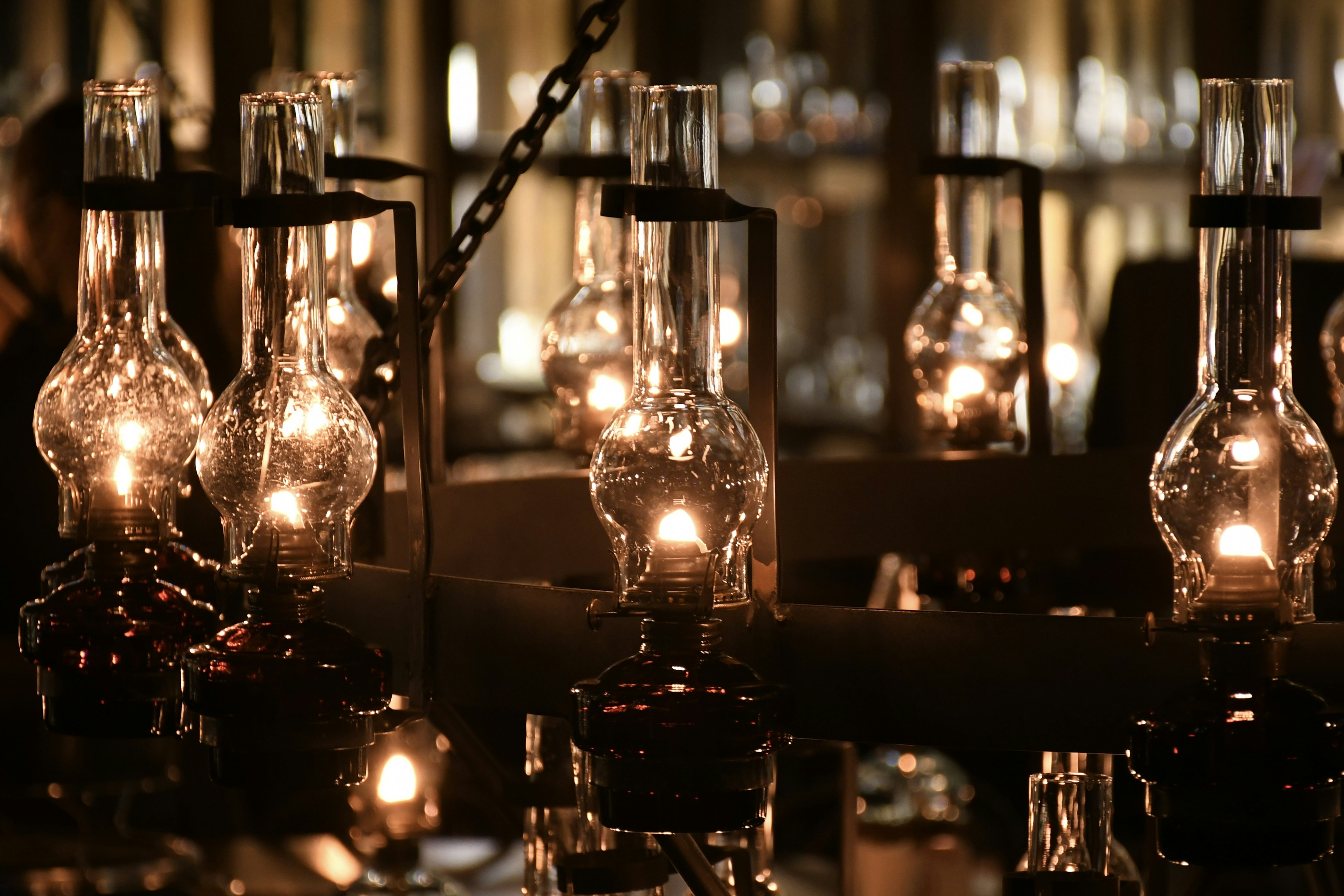 A collection of oil lamps emitting warm light