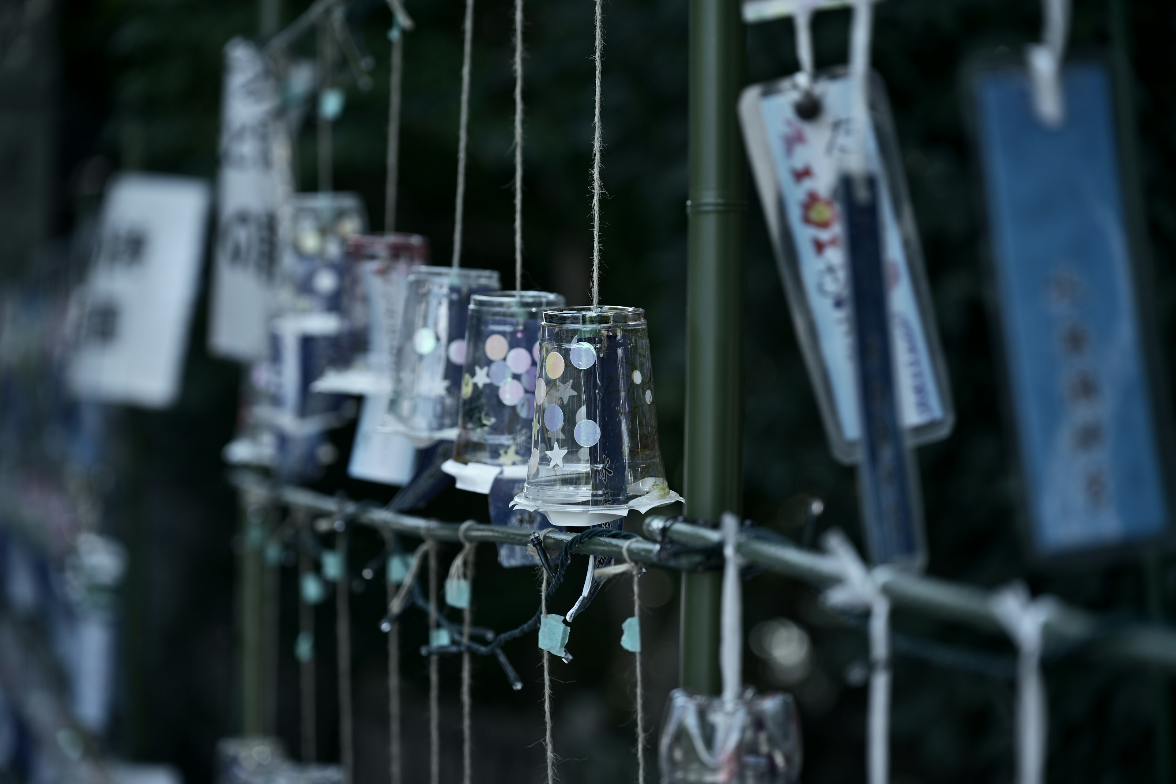 Image of wind chimes hanging outdoors