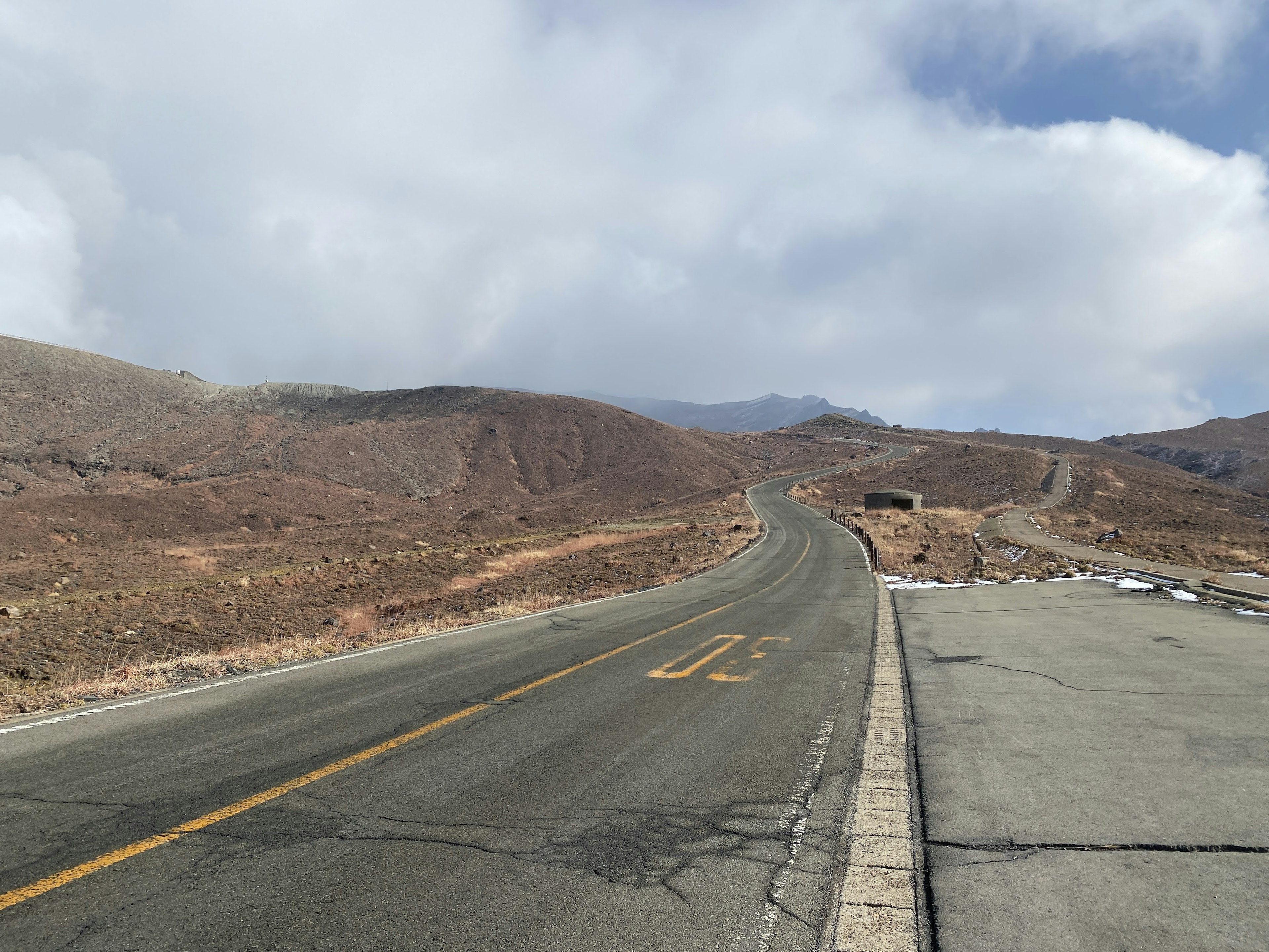 Winding road through a barren mountainous landscape