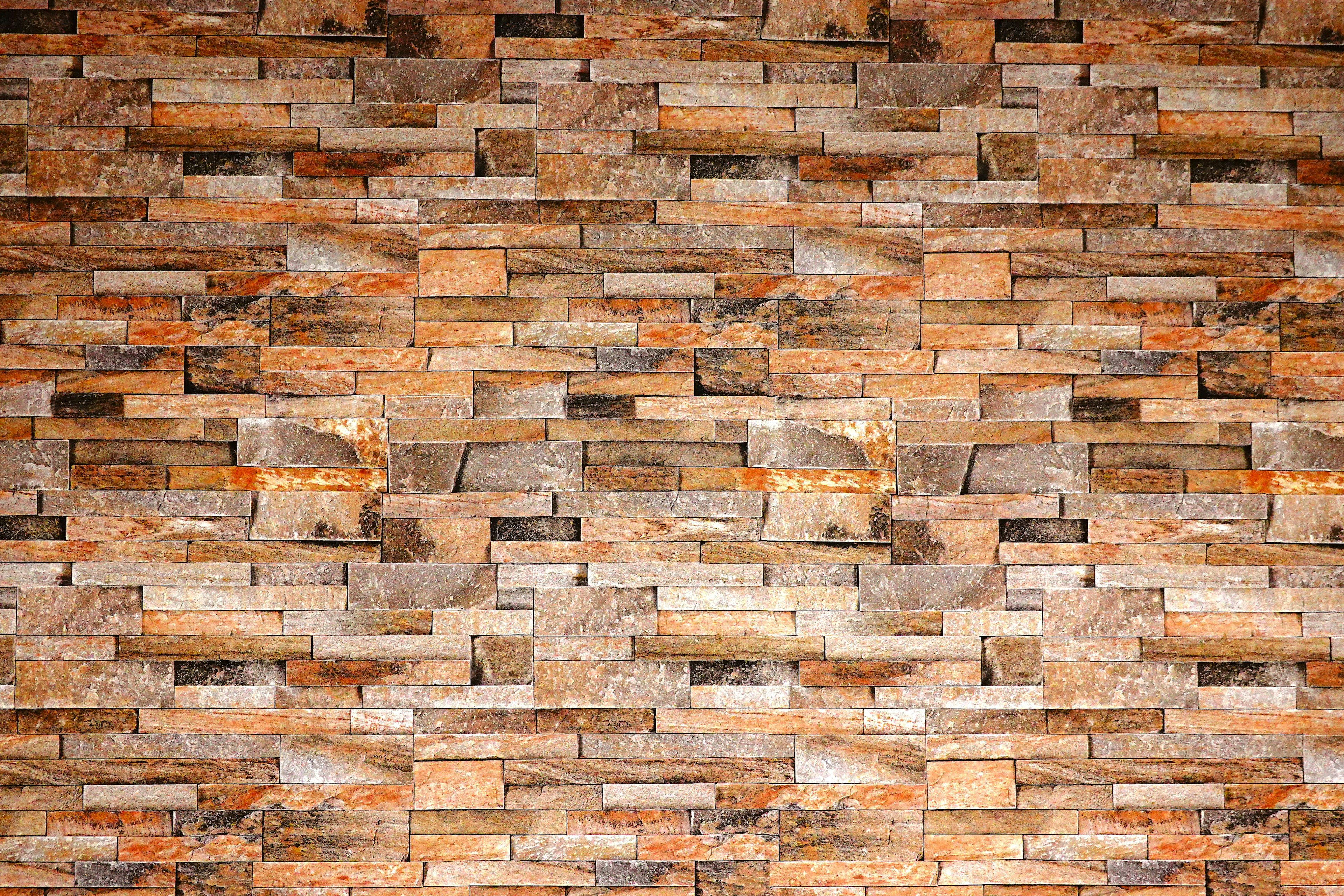 Wooden textured wall with brick-like pattern