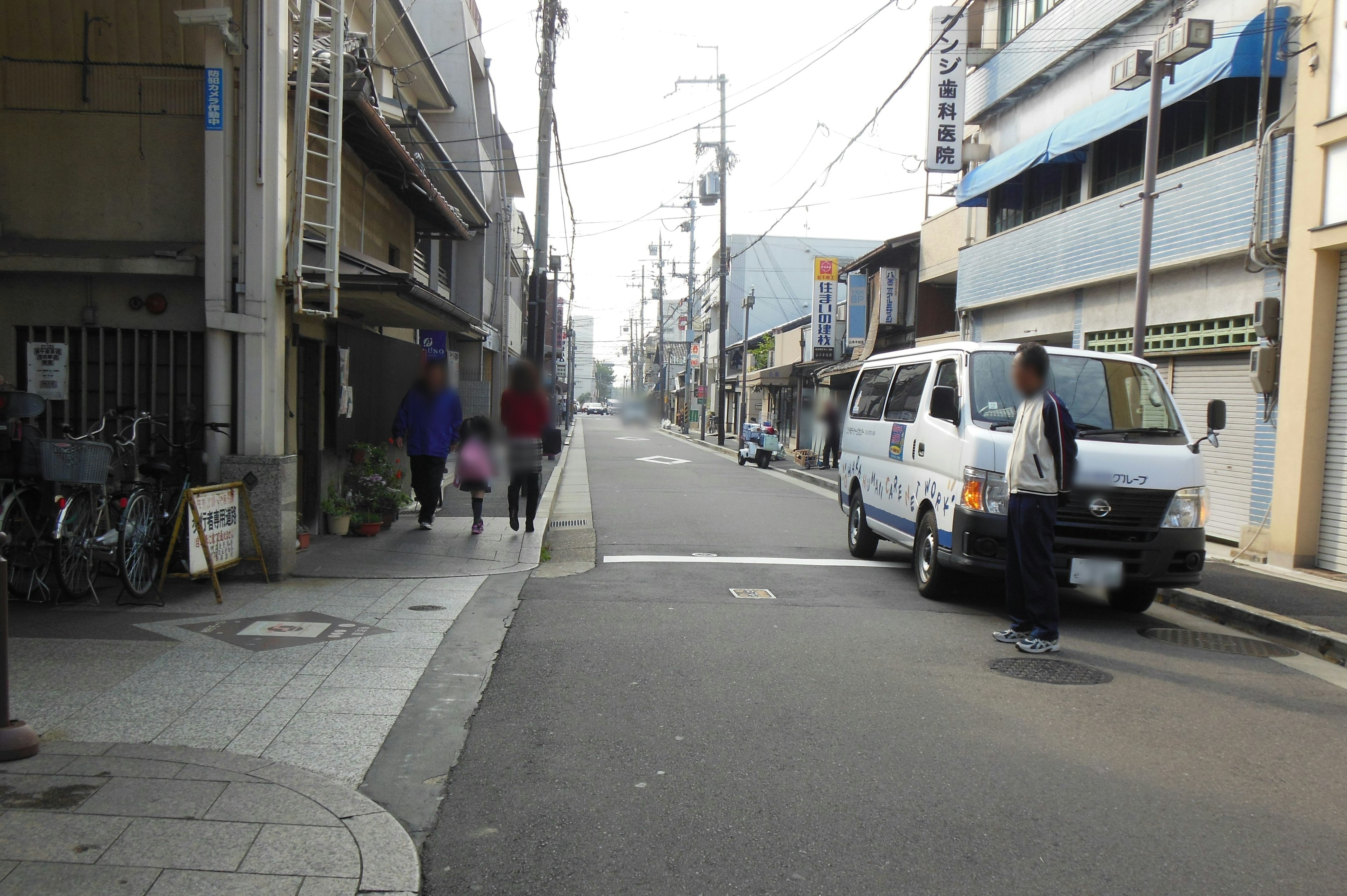 Quiet street in a Japanese town with commercial buildings