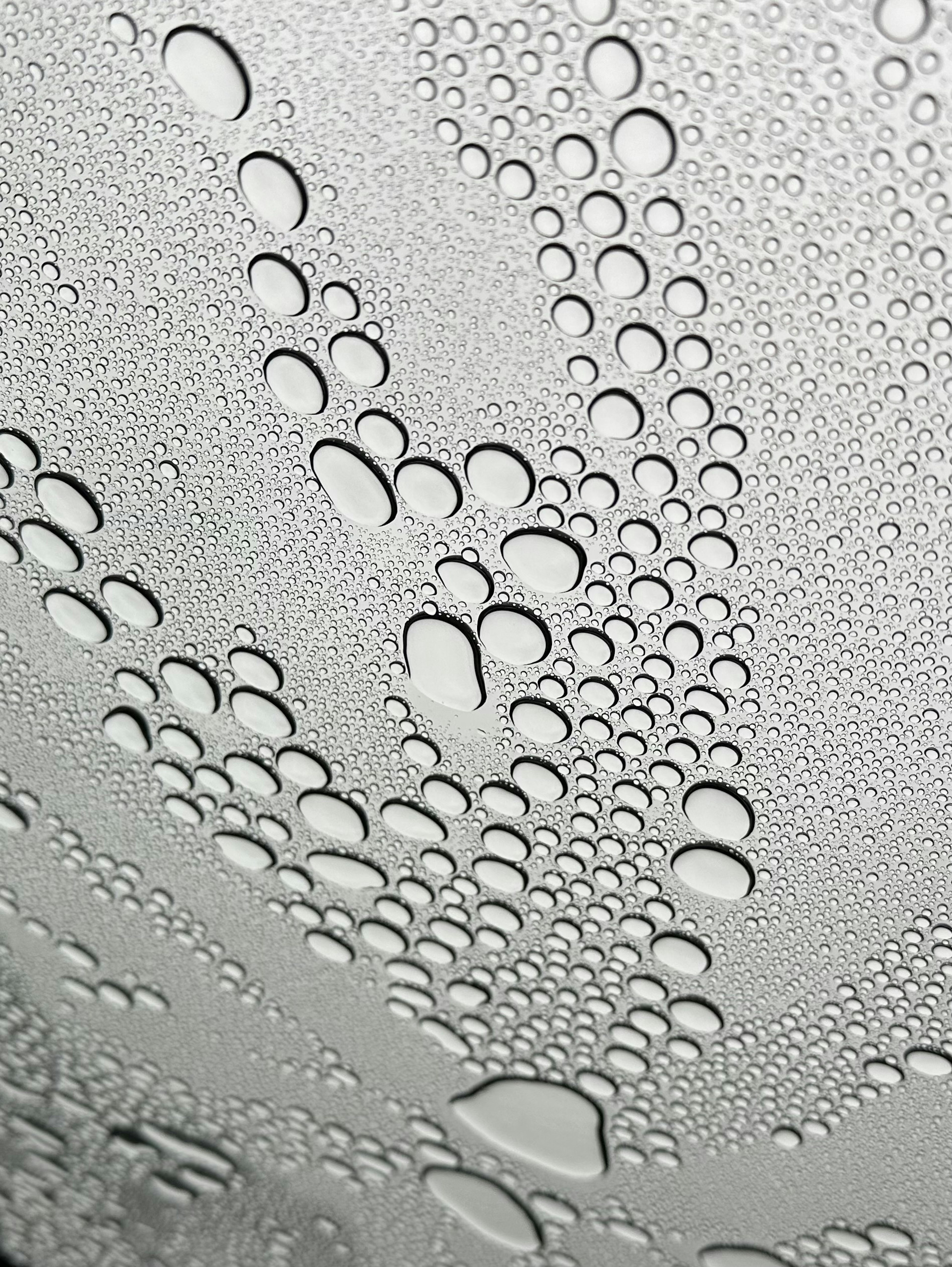 Image showing water droplets spread across a surface