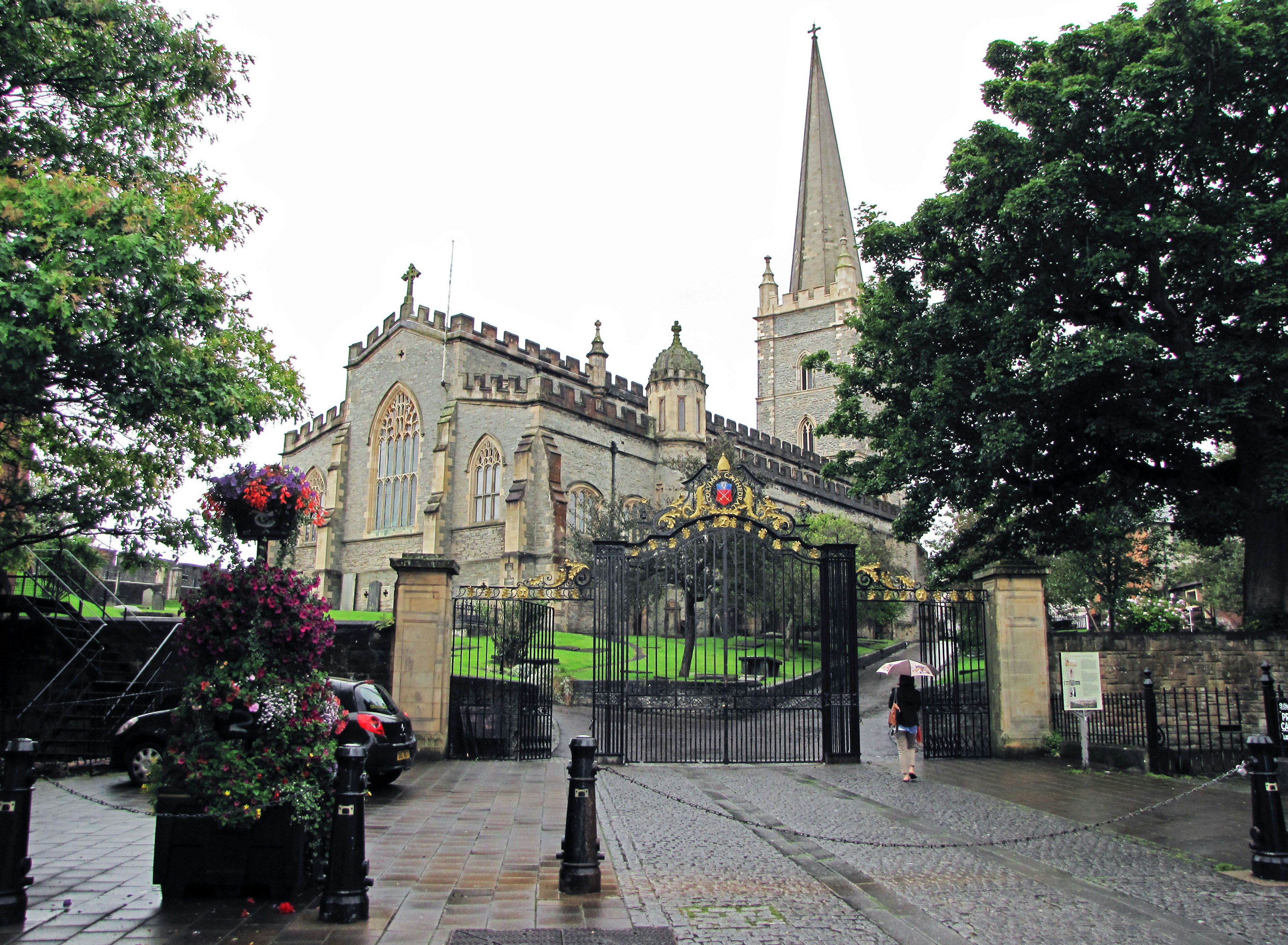 Beautiful church and green garden scene in the rain