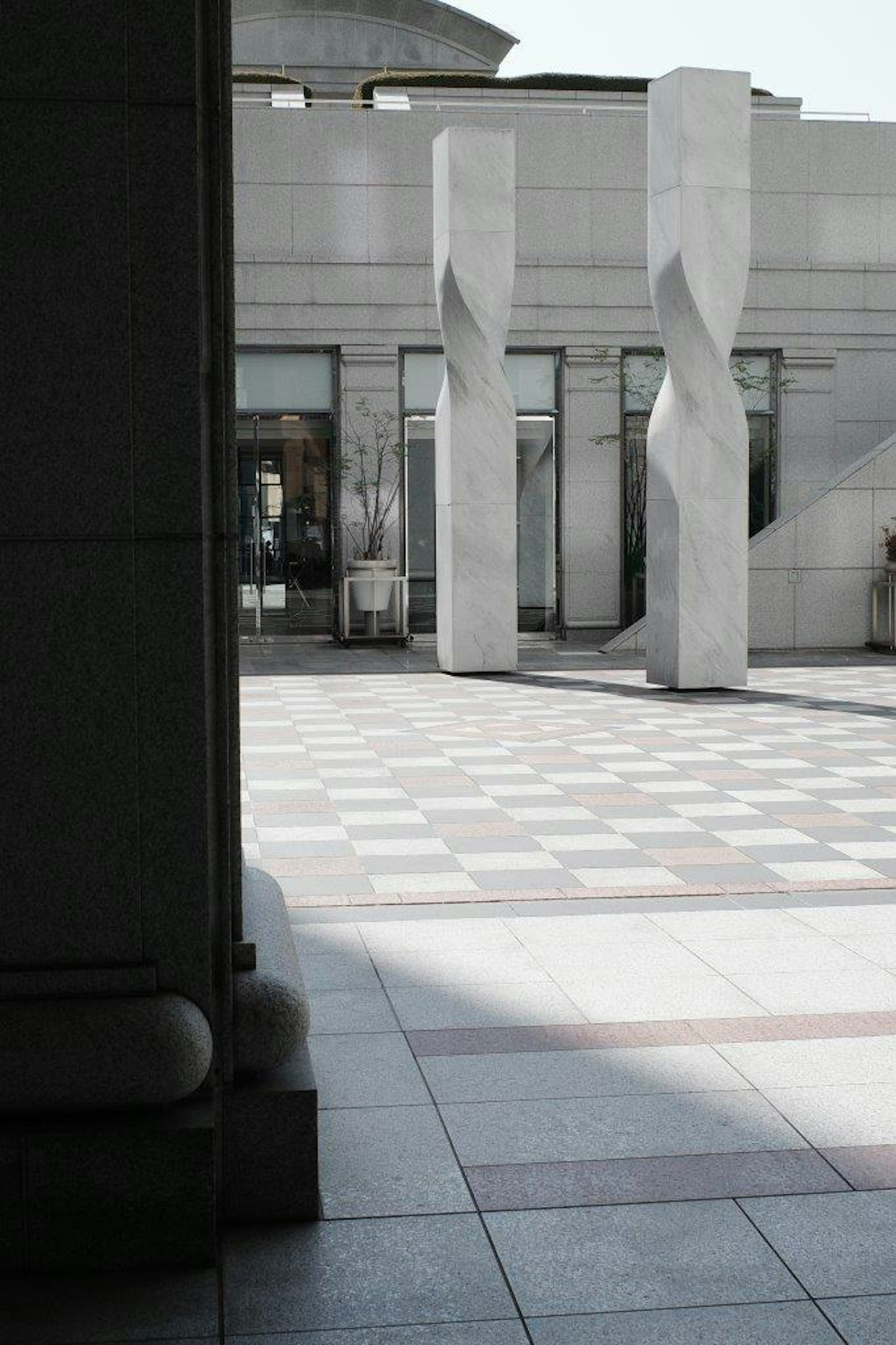 View of a courtyard with modern sculptures