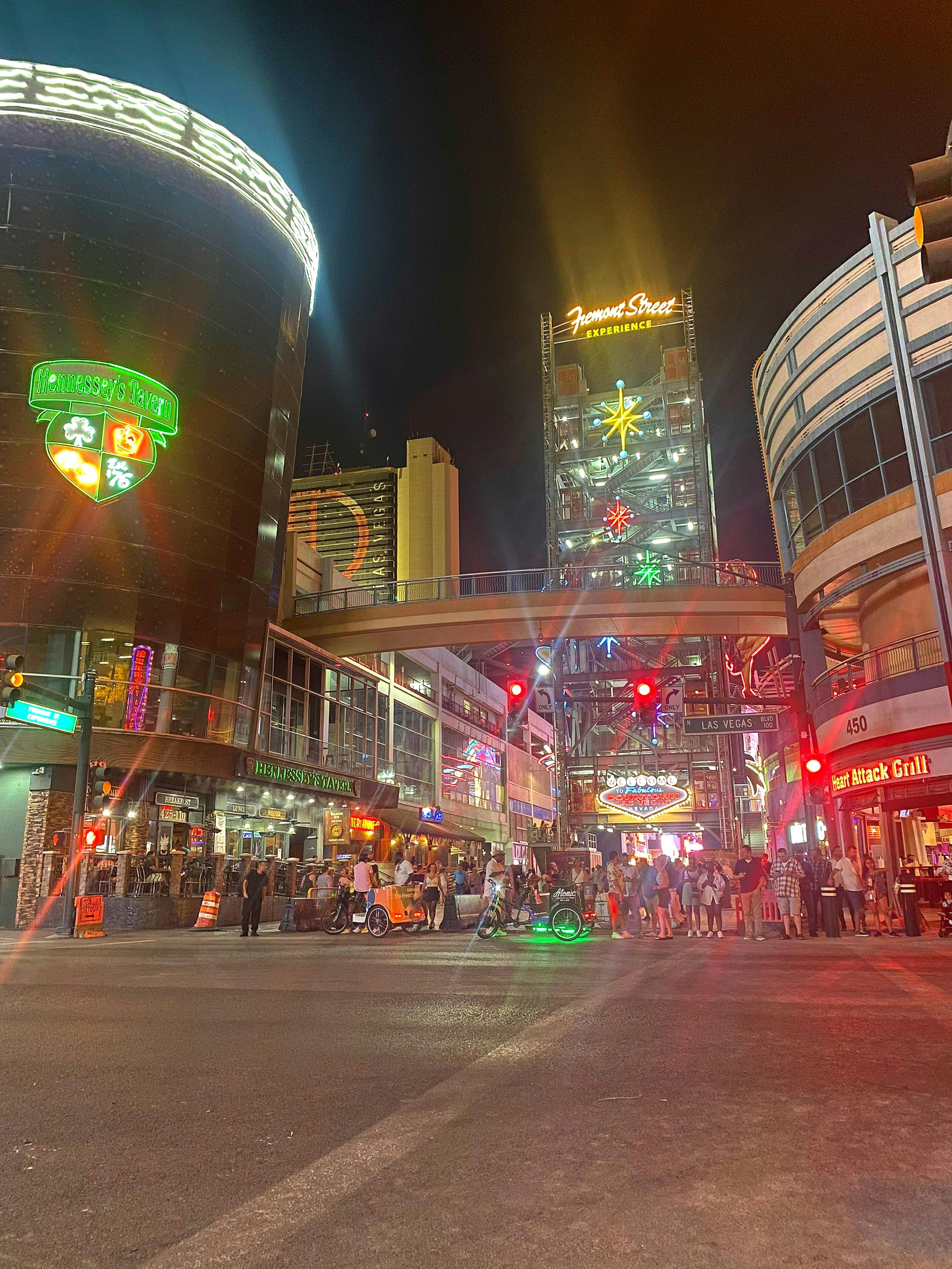 Nighttime cityscape featuring casinos and vibrant neon signs