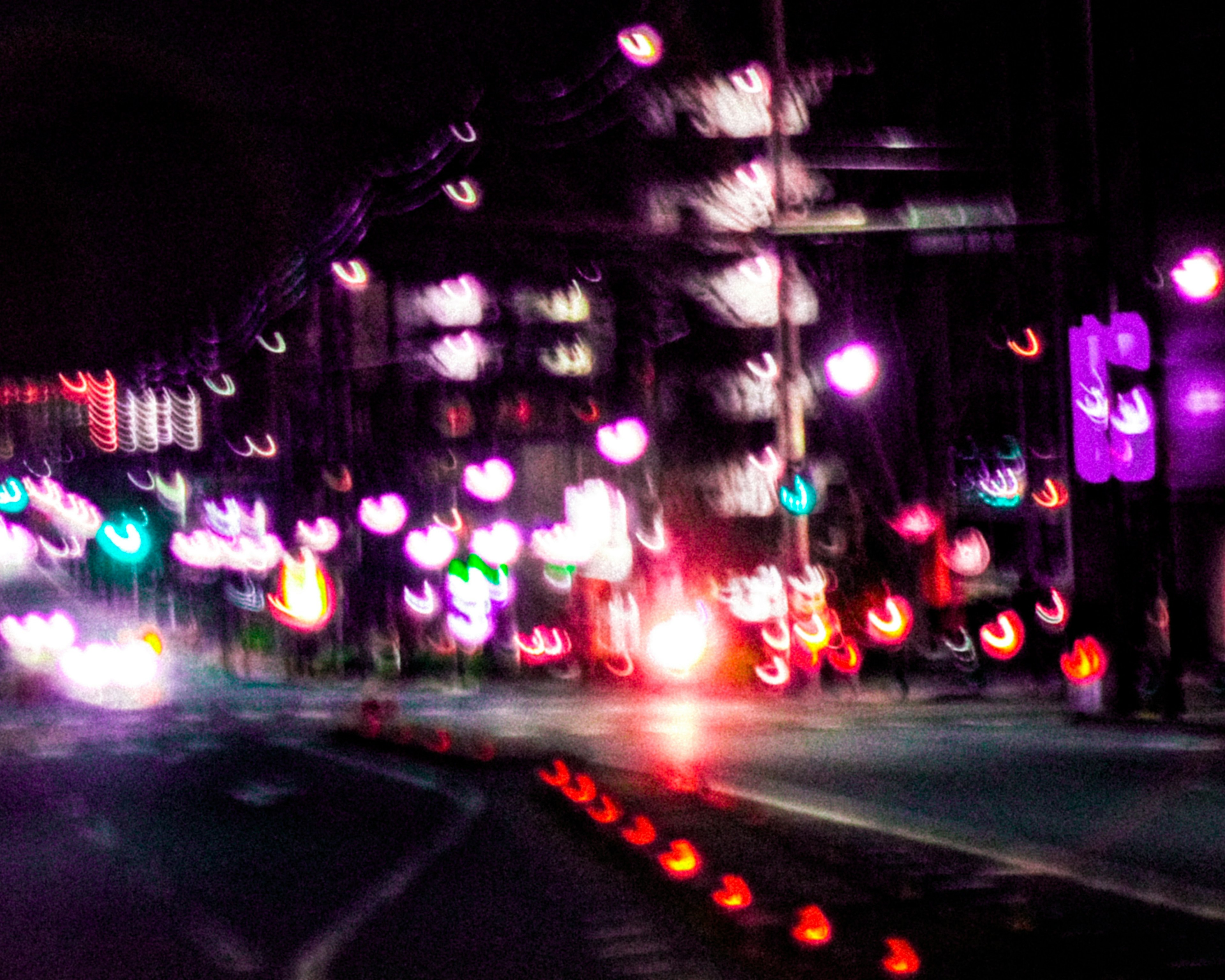 Blurred night cityscape with colorful lights