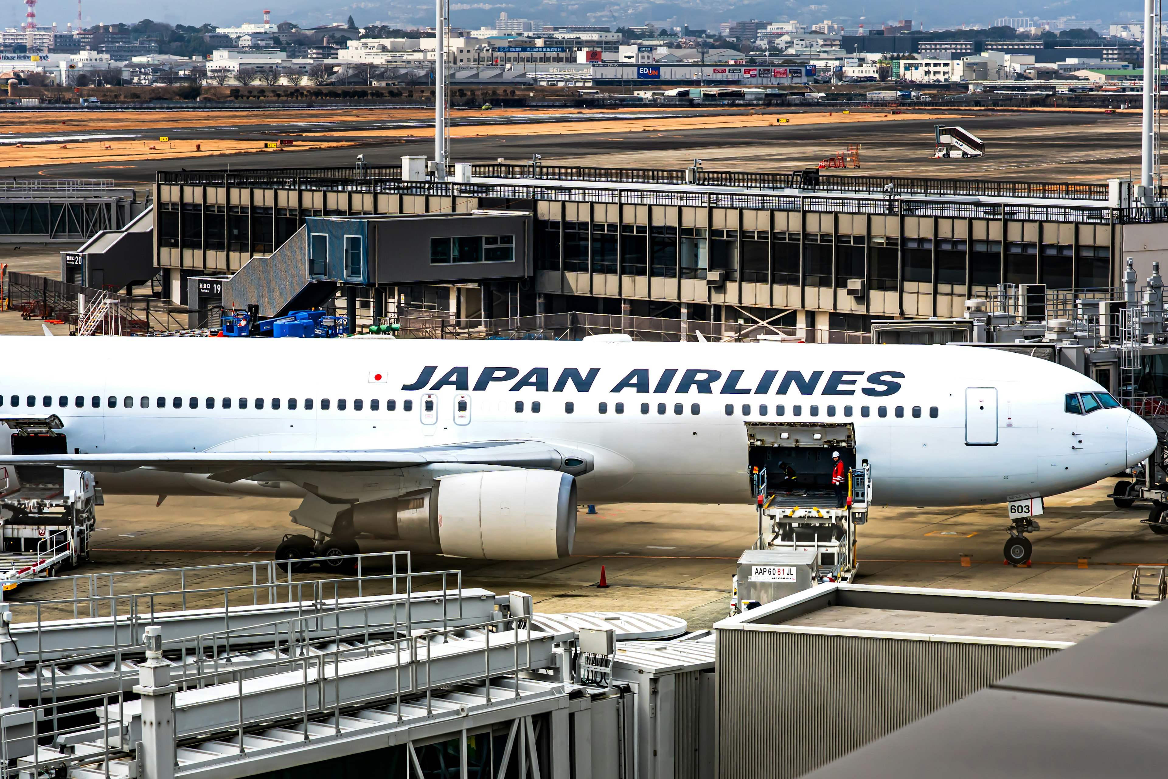 Japan Airlines Boeing 777 parked at the airport