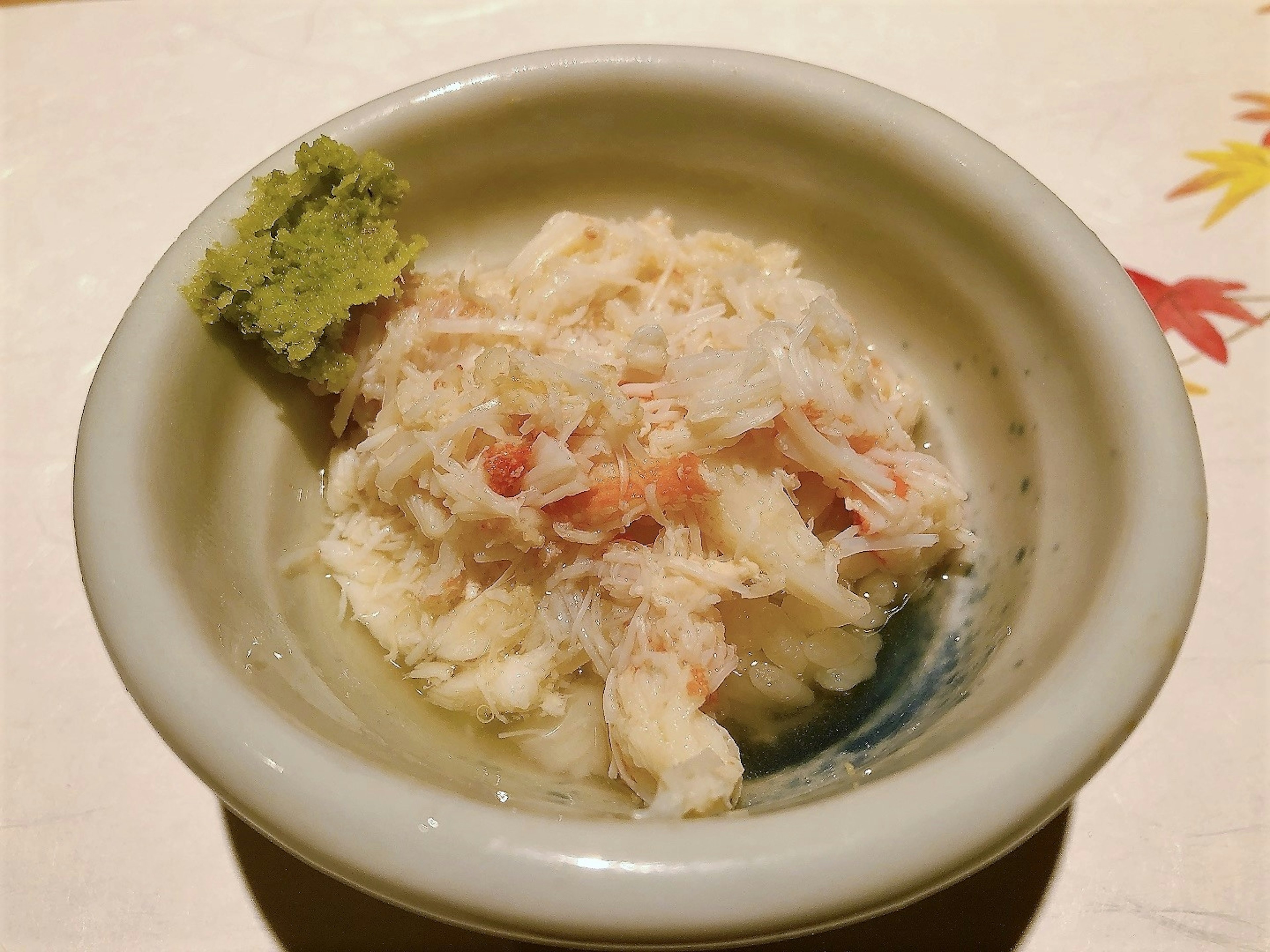 Sashimi of white fish with wasabi served in a bowl