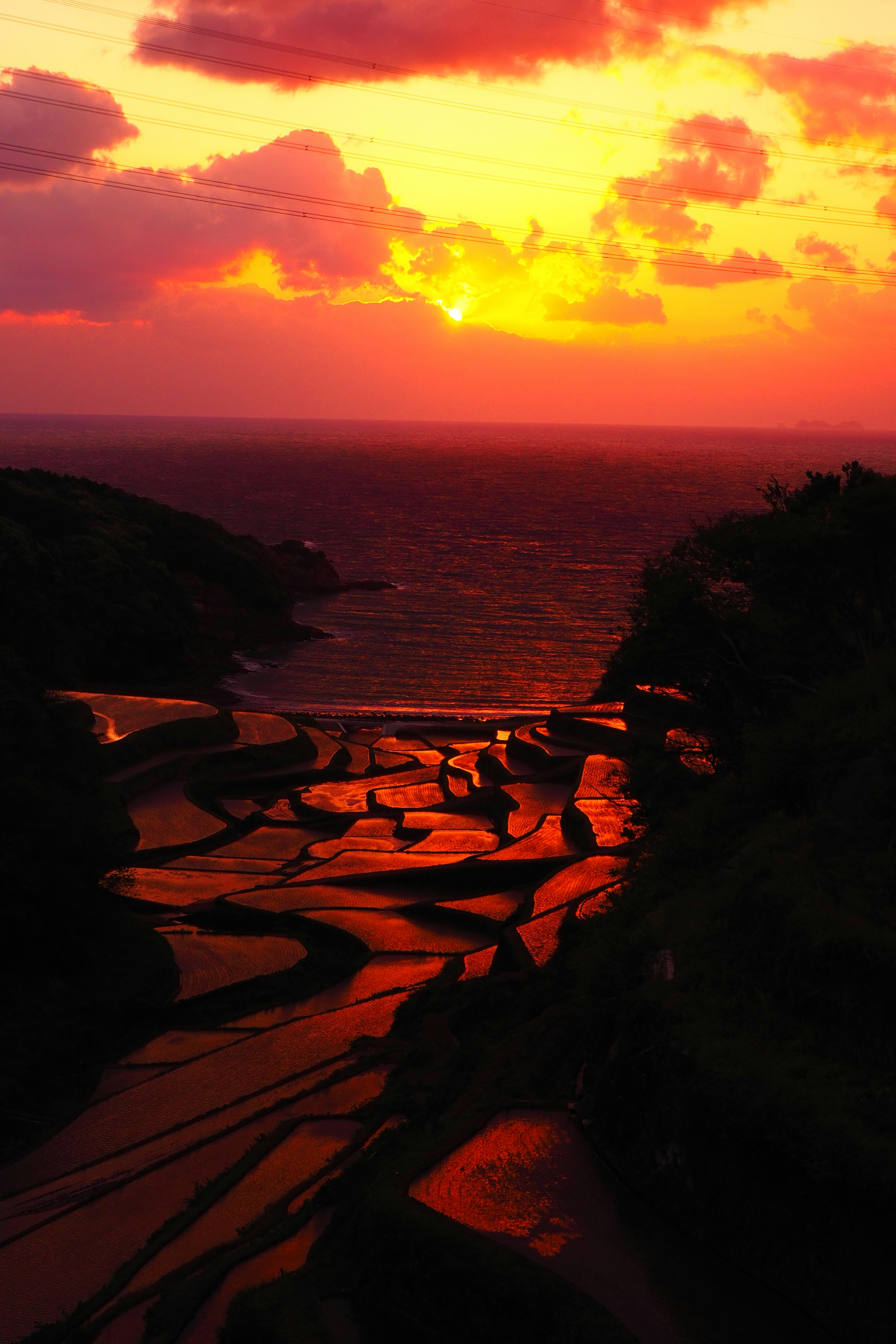 Stunning sunset over the ocean with vibrant colors reflecting on the water