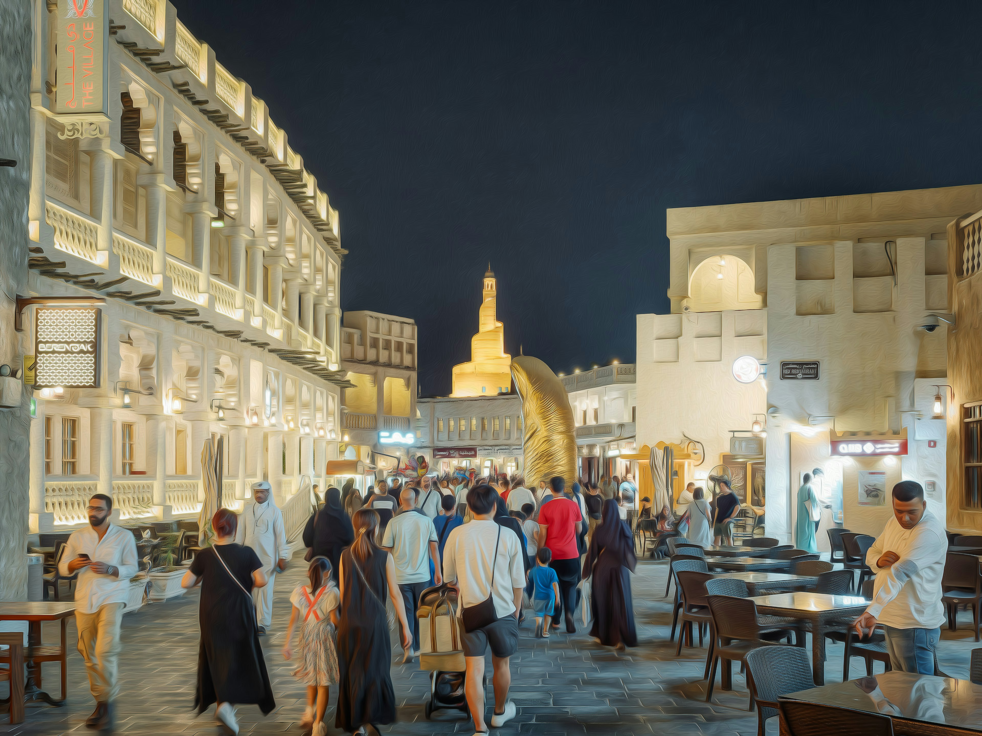 Folla di persone che camminano in una strada affollata in Qatar di notte