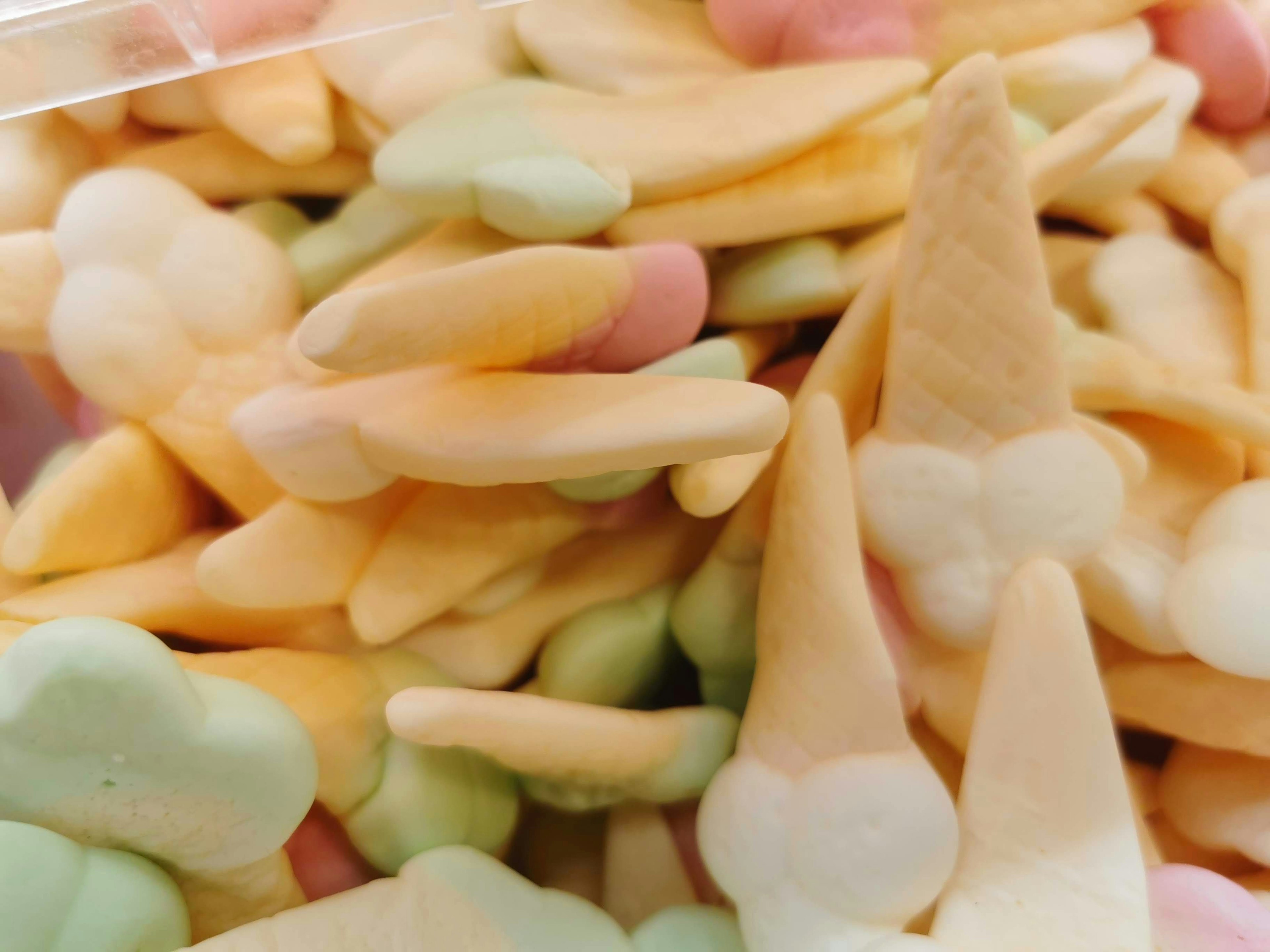 Colorful assortment of candy shaped like ice cream cones