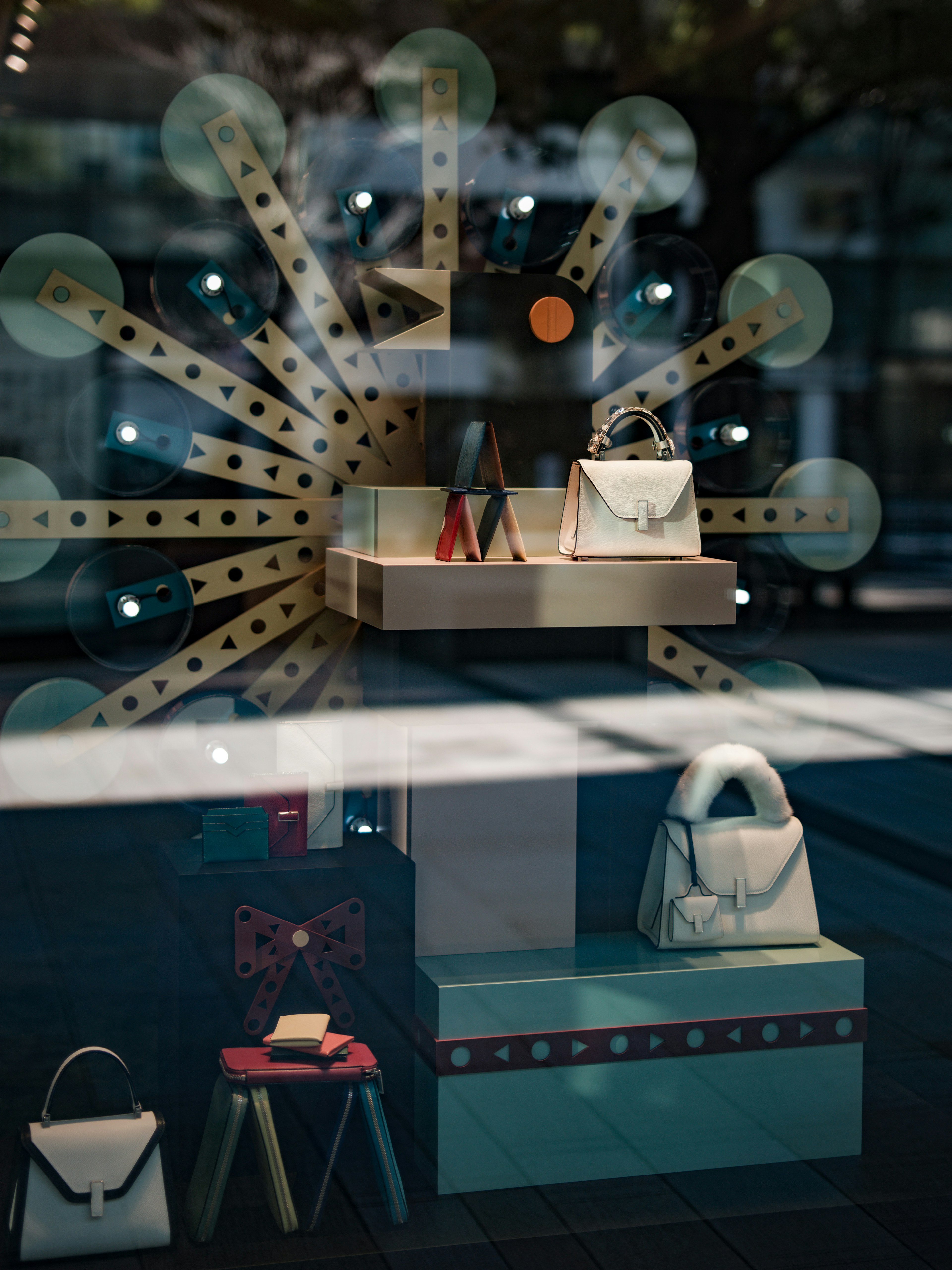 Display of handbags and shoes in a store window