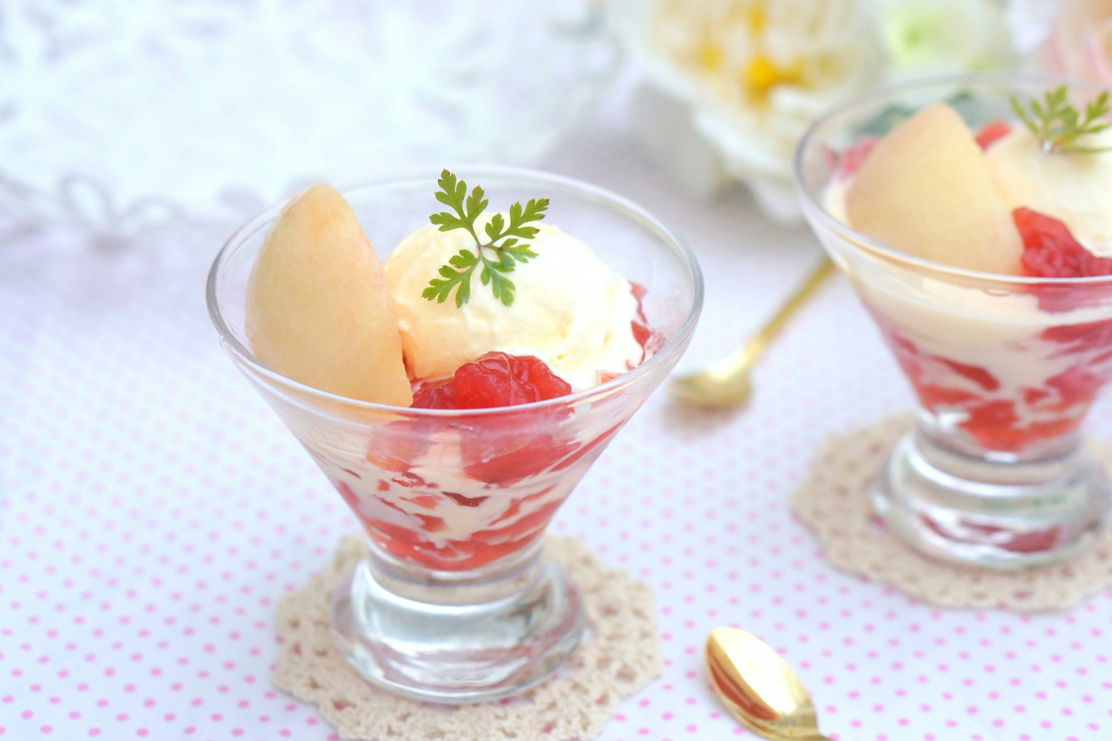 Dessert cup filled with cream and strawberries