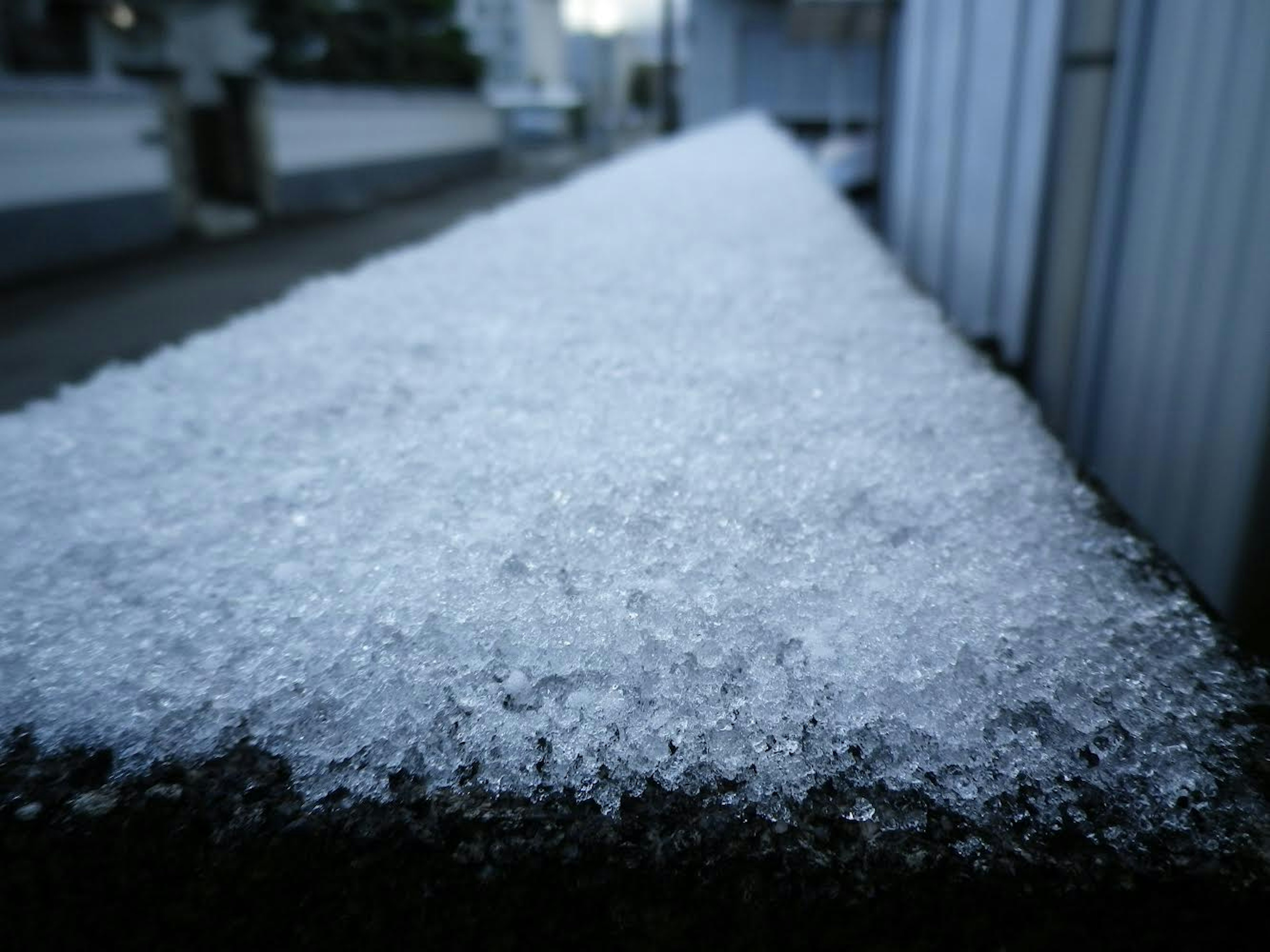 Close-up of a surface covered in snow crystals