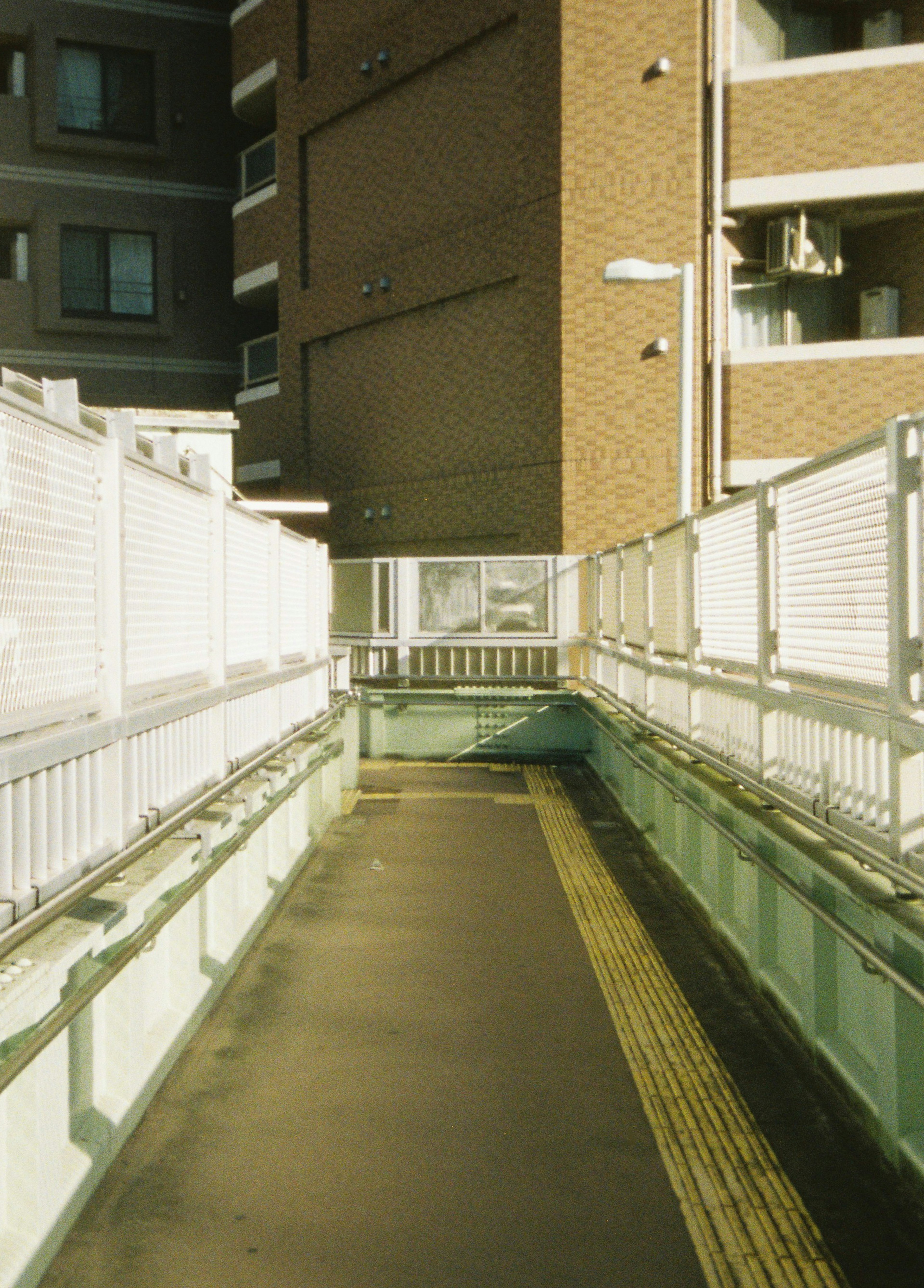 Pedestrian bridge with surrounding buildings