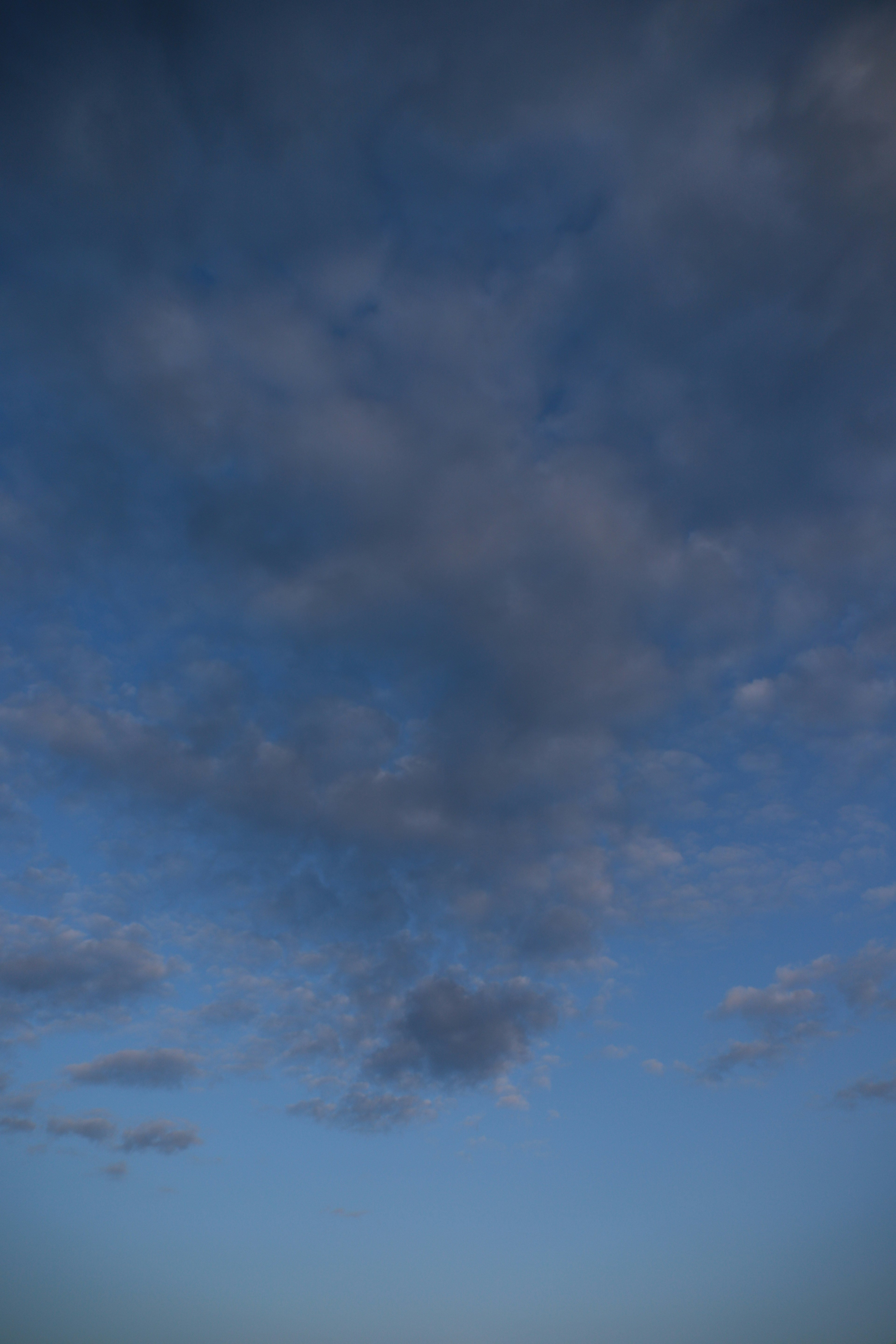 Clouds floating in a blue sky