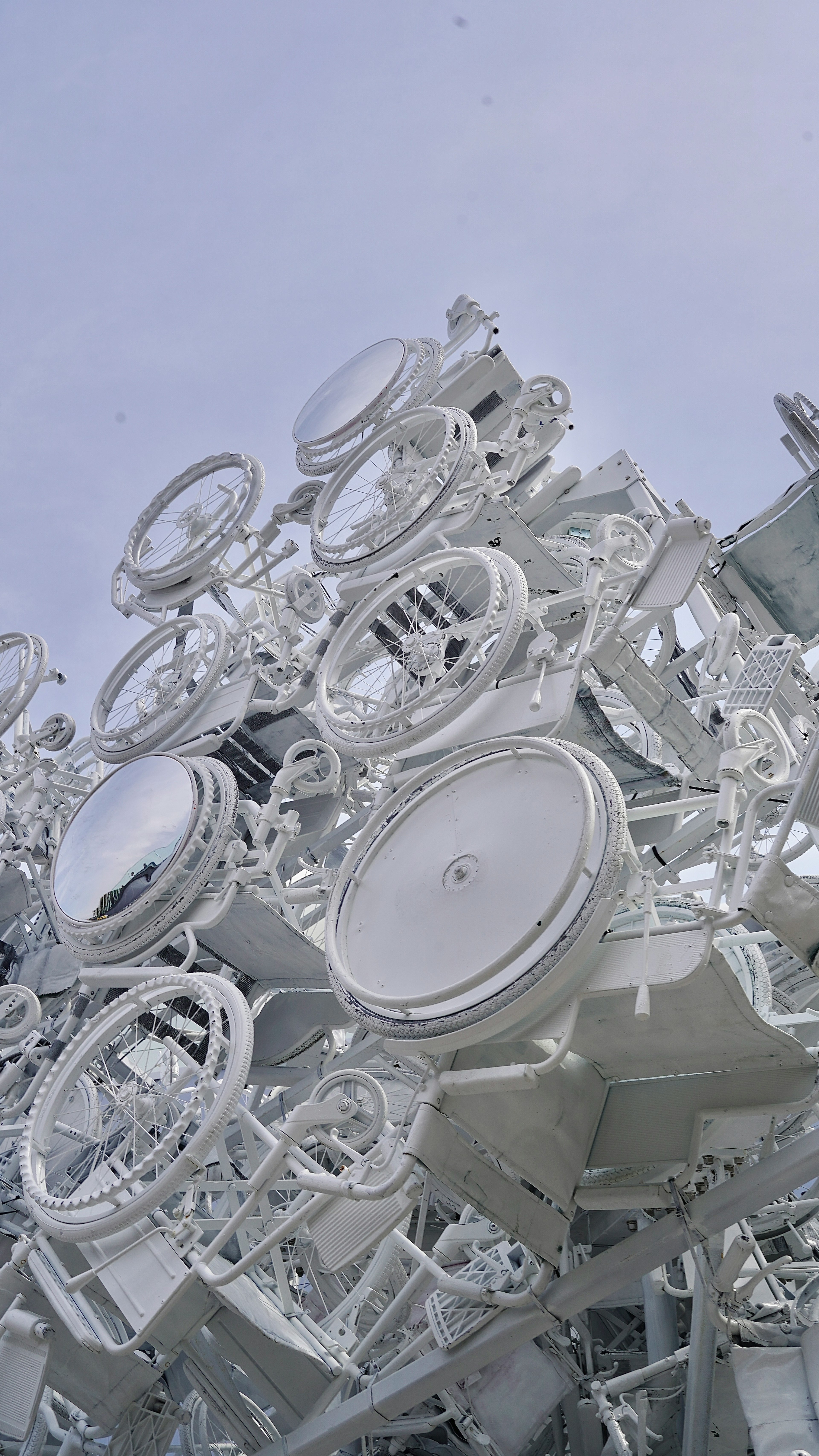 Close-up of a structure featuring white communication devices