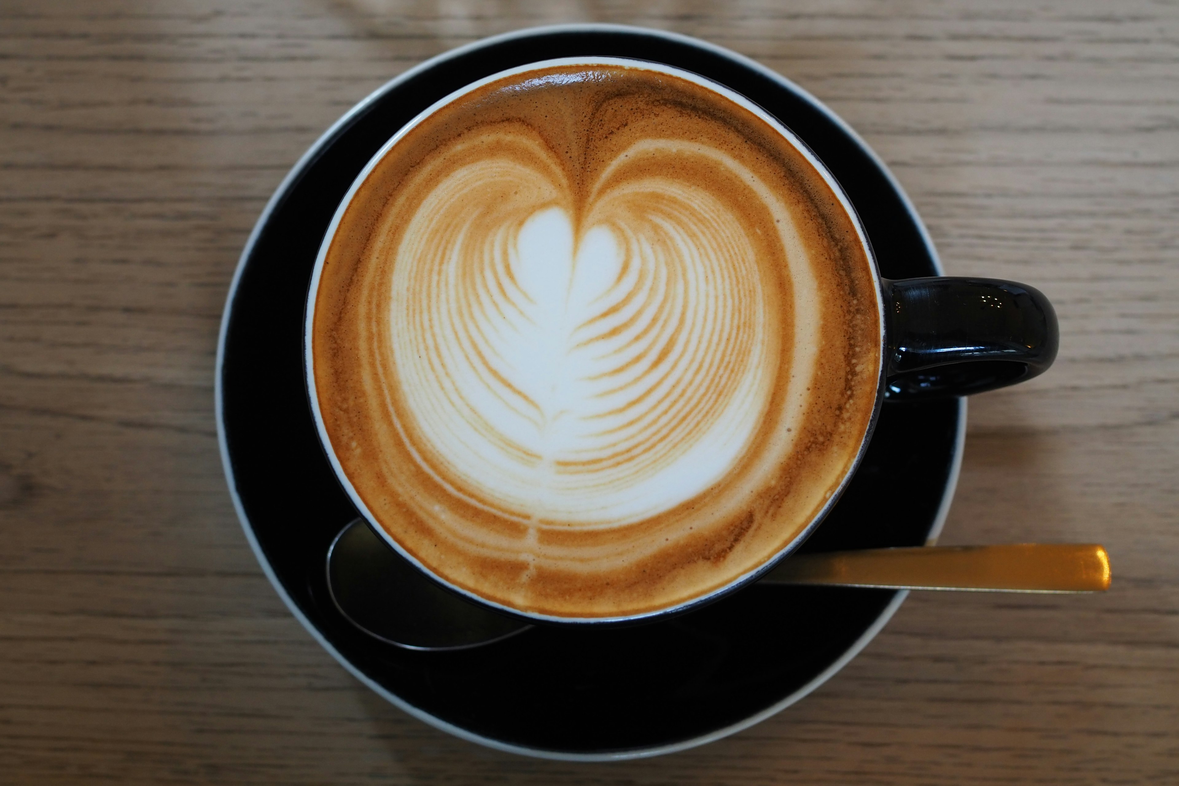 Coffee with beautiful heart-shaped latte art