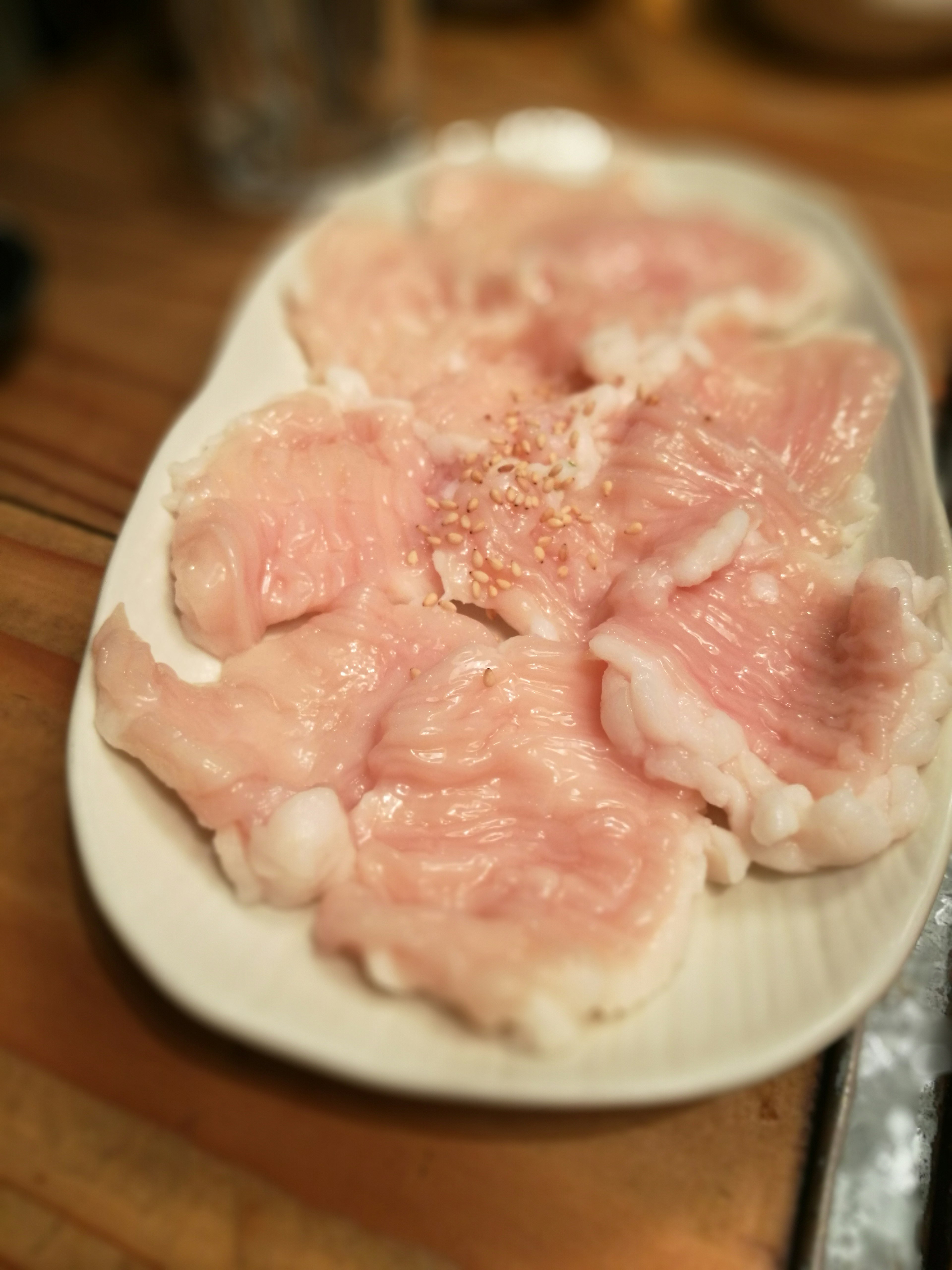 Sliced pork arranged on a plate