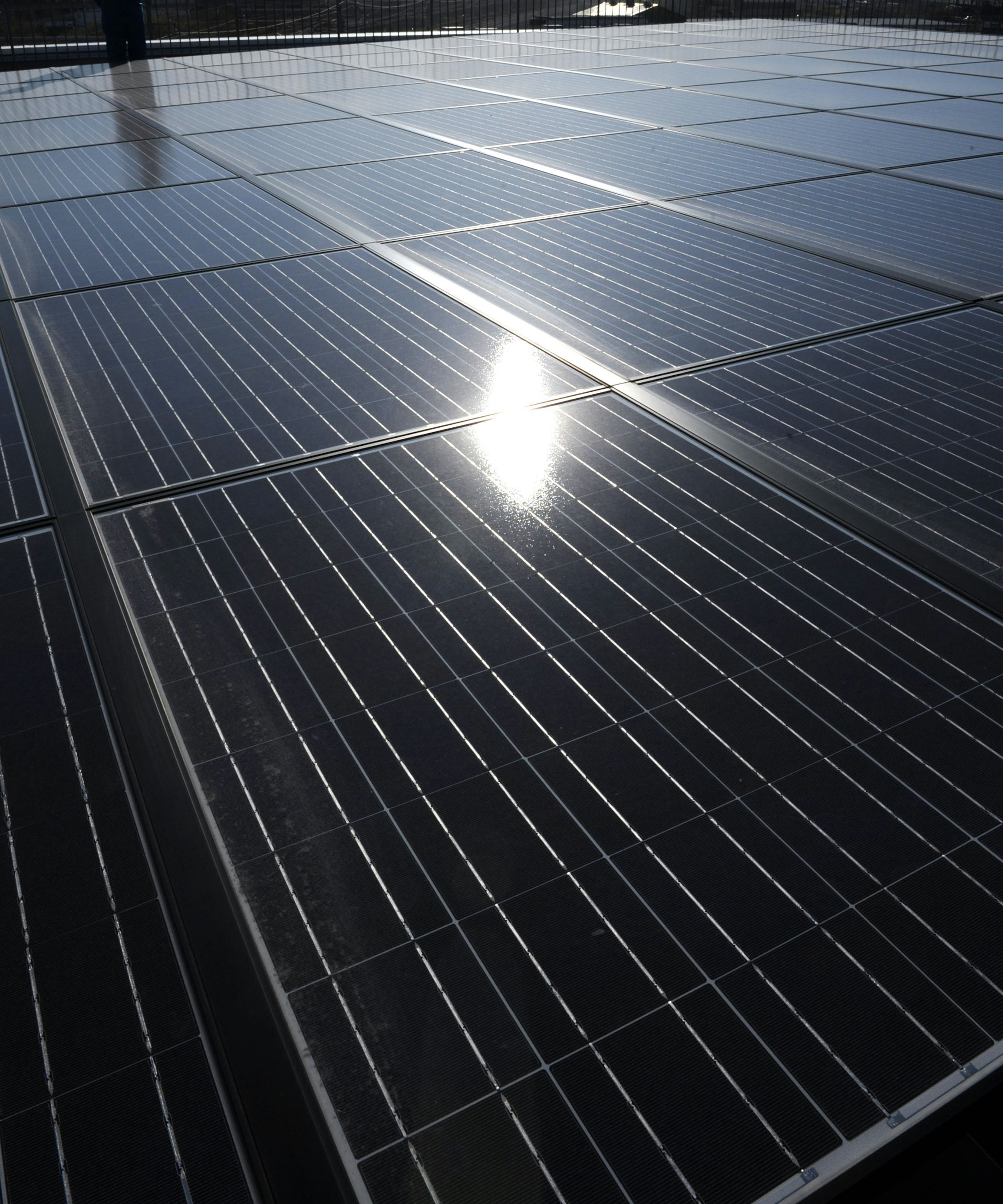 Reflection of sunlight on solar panel surface