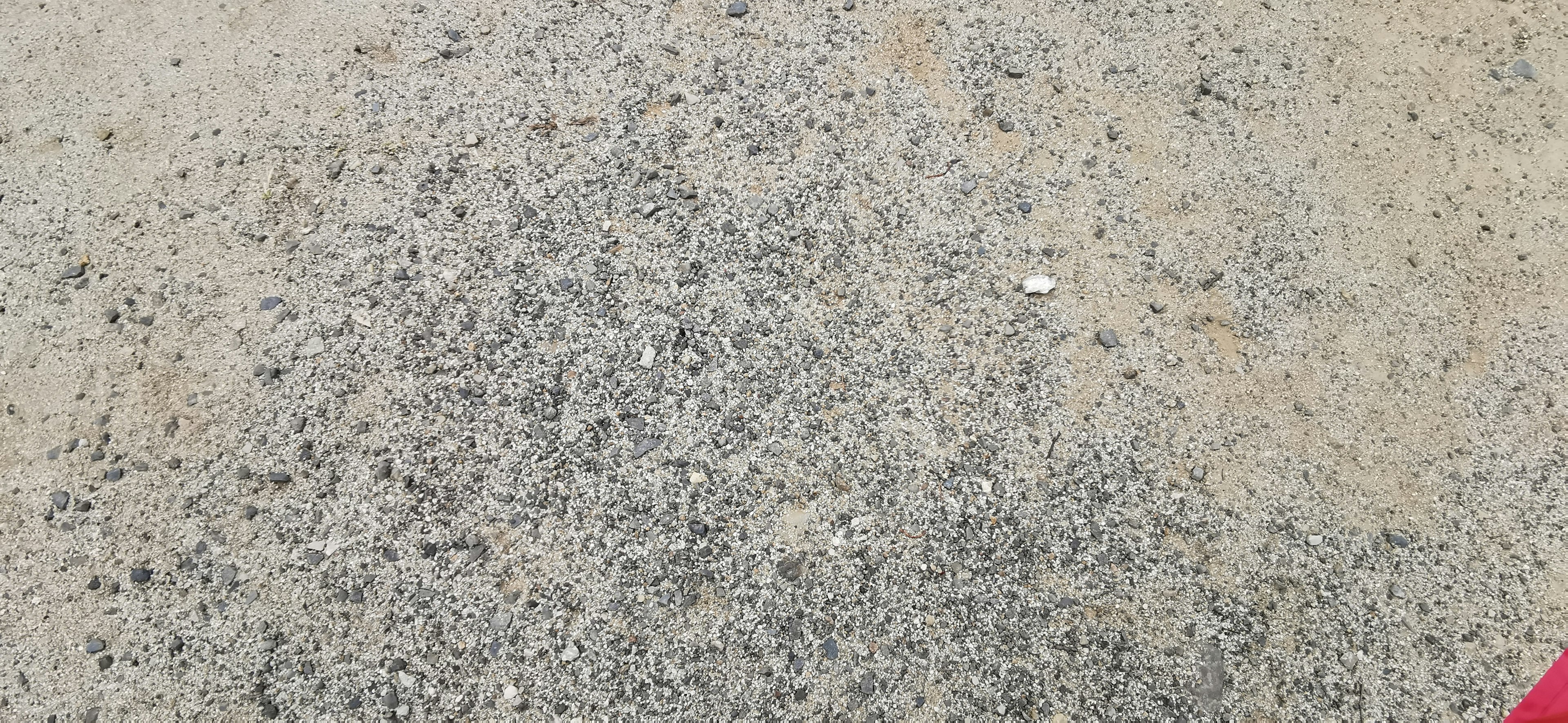 Texture of ground covered with gravel and small stones