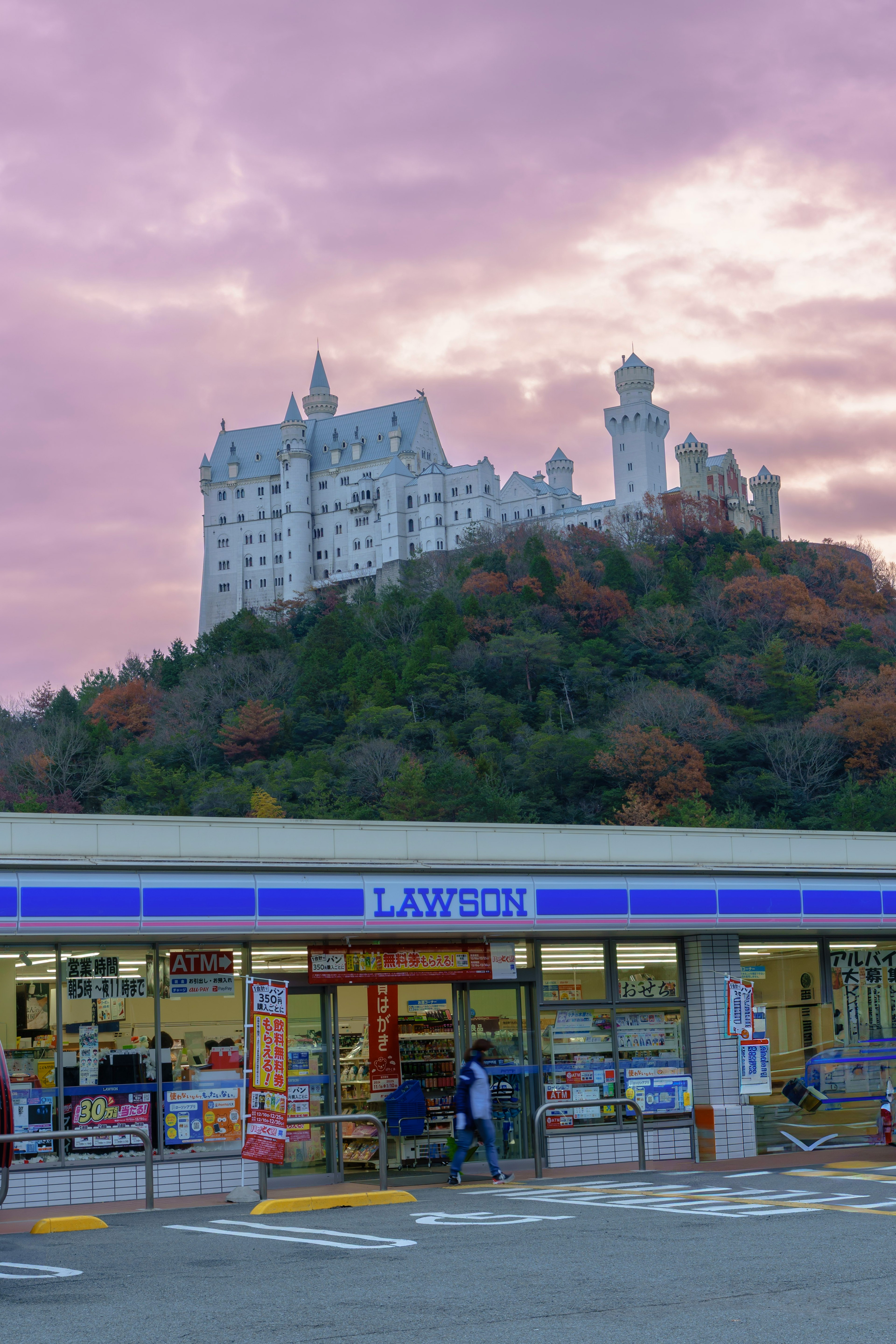 Tienda Lawson en primer plano con un castillo en una colina bajo un atardecer colorido