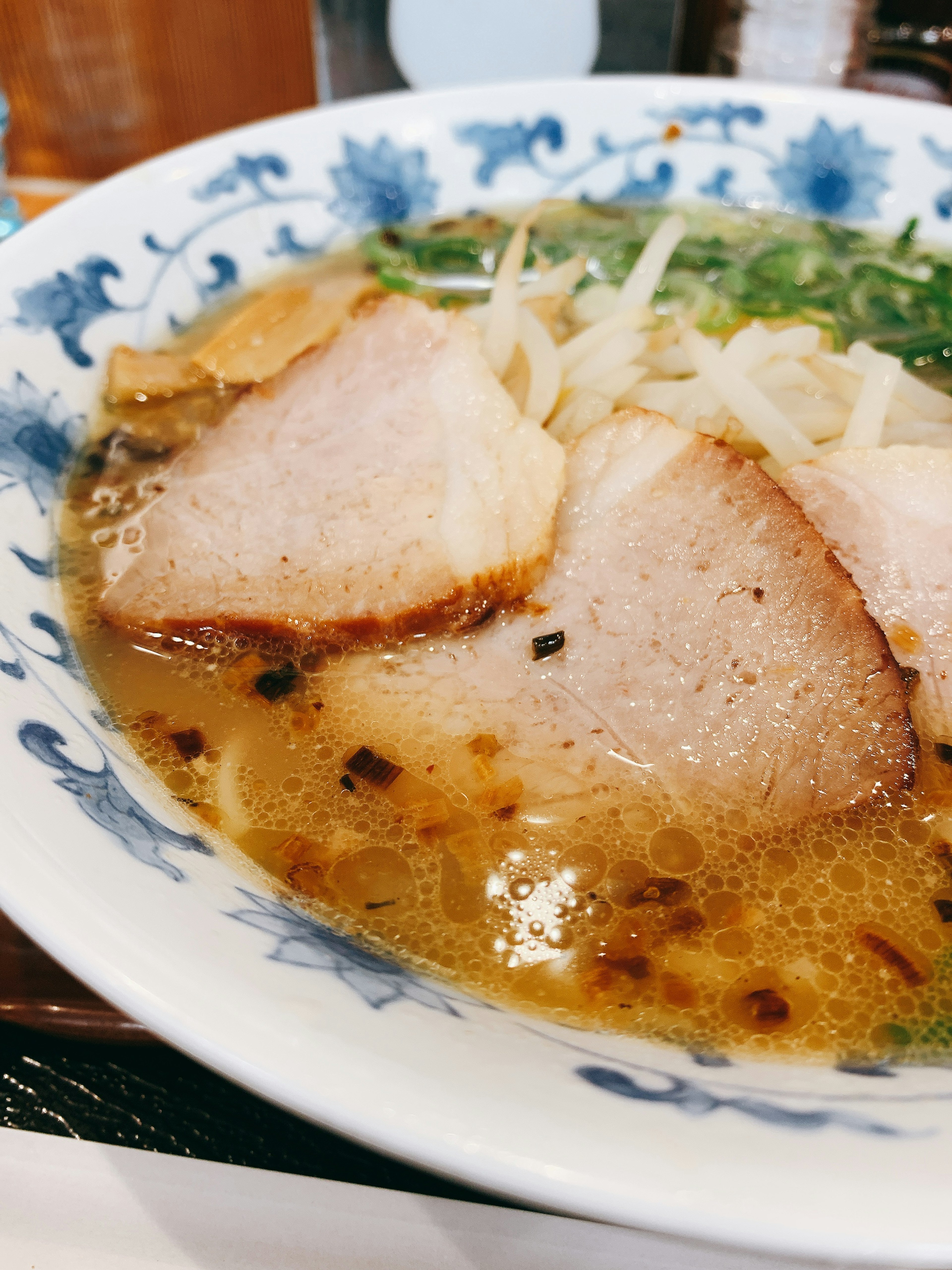 Ramen bowl with slices of pork and broth