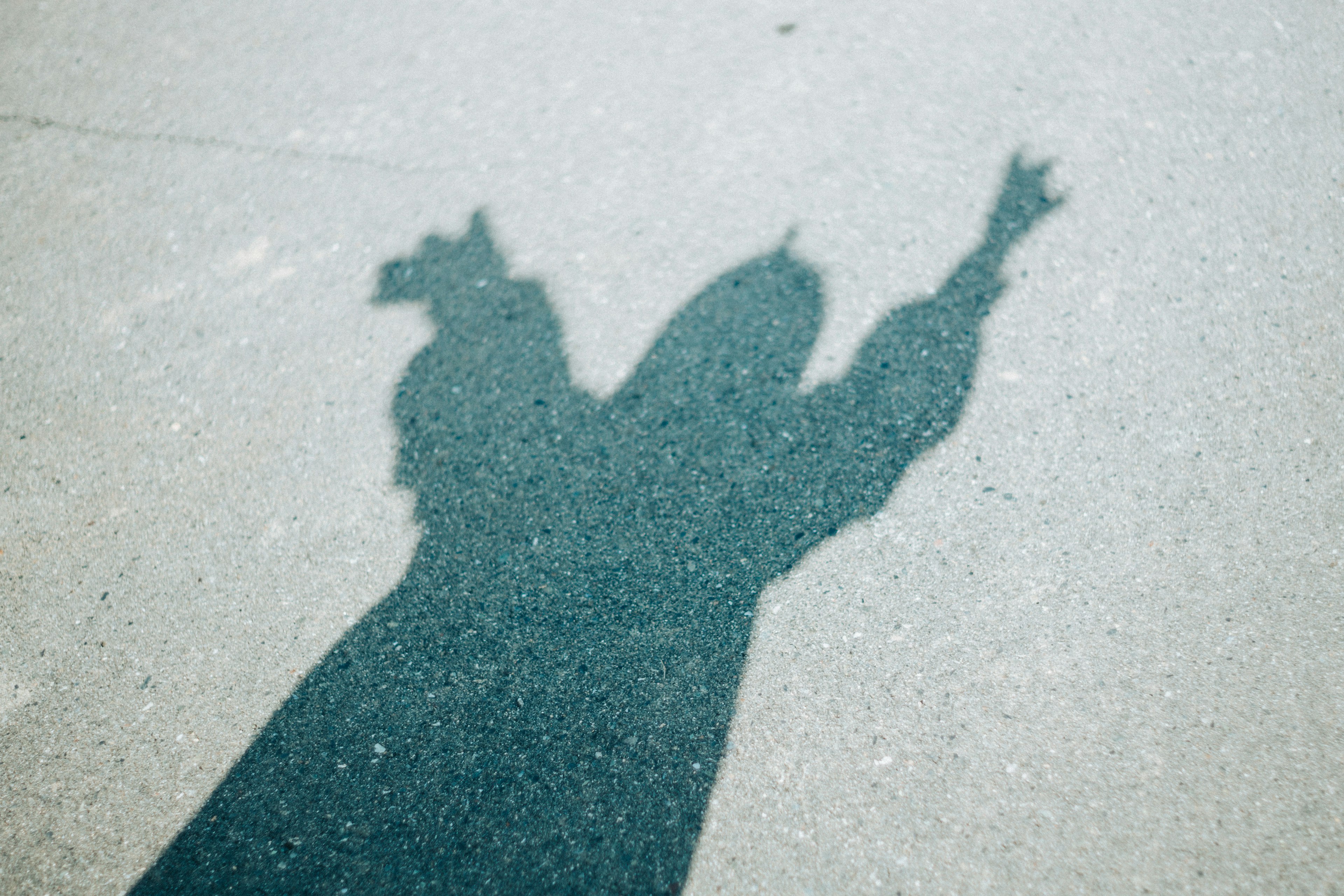 Unique silhouette of a person reflected on the ground