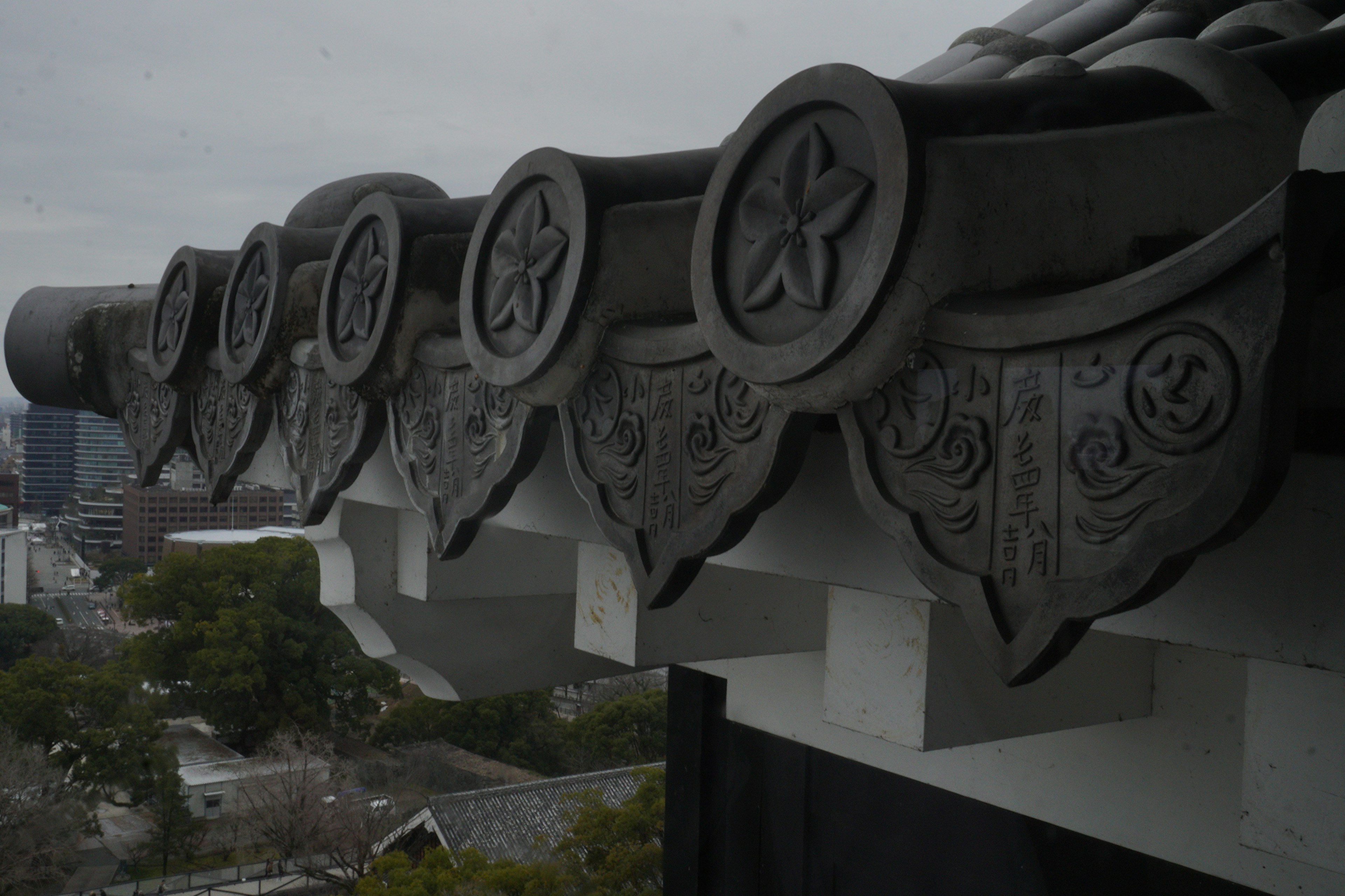 Decorative elements of a roof featuring ornate designs and star motifs