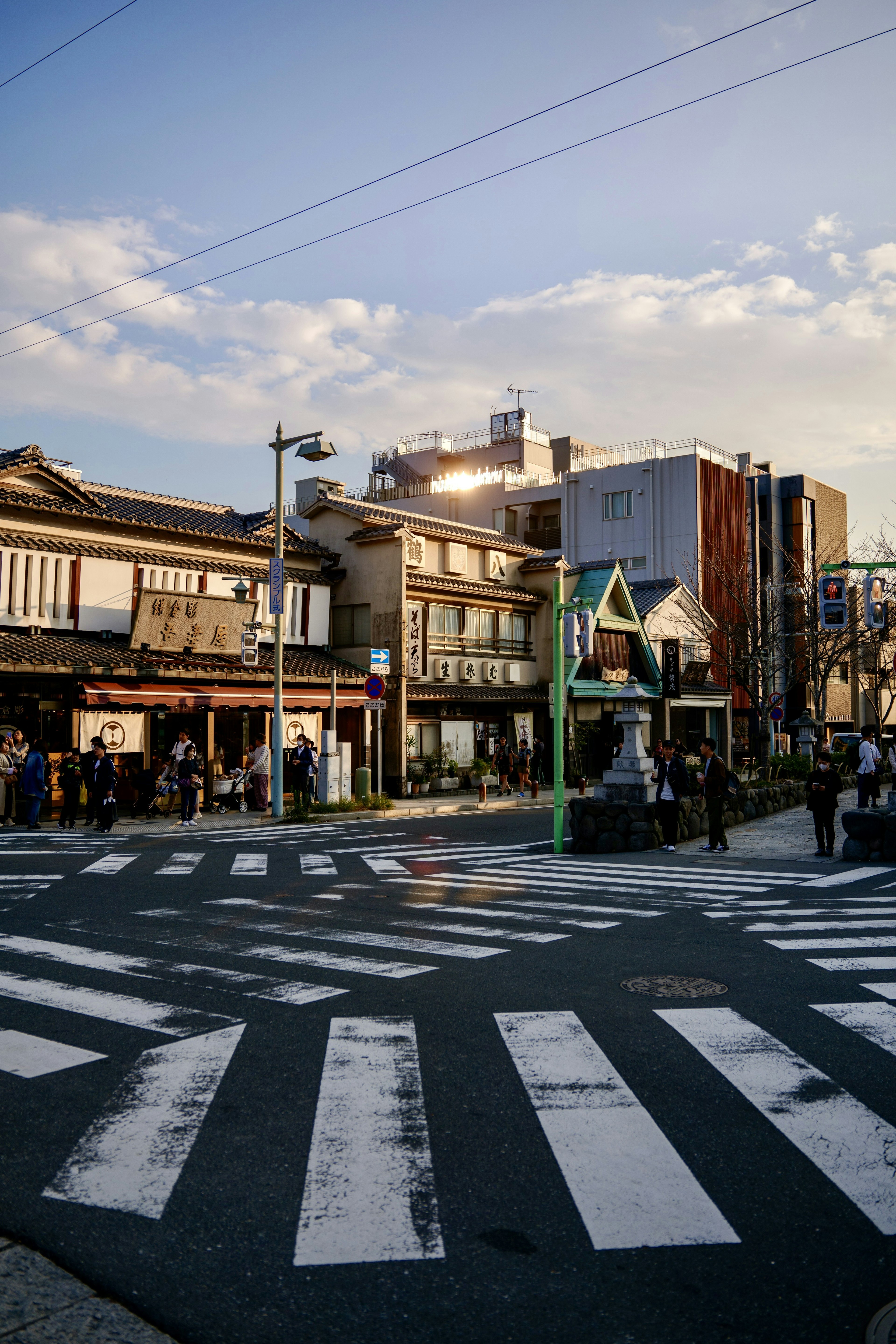 Intersection featuring a blend of traditional and modern buildings