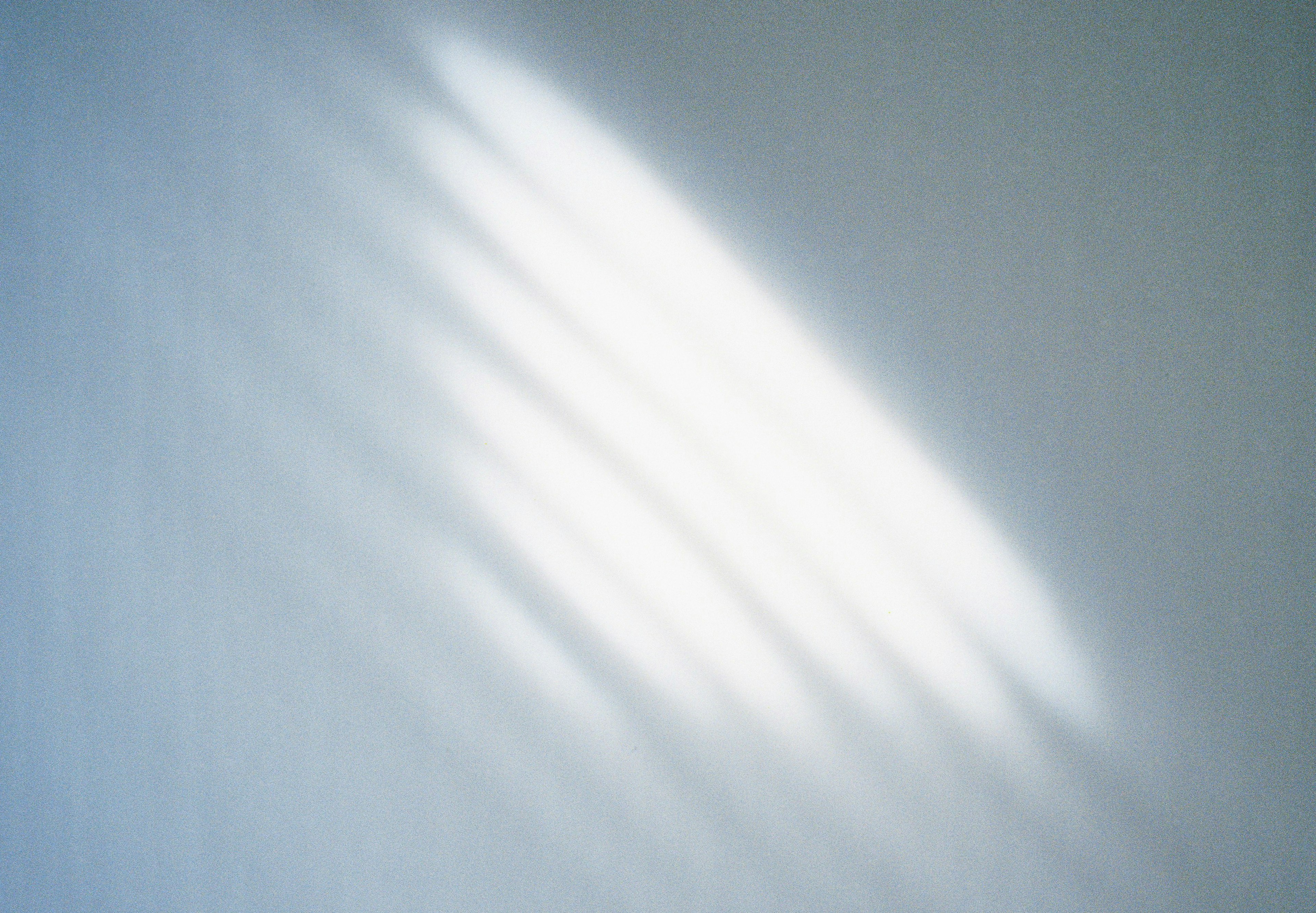 Abstract pattern of light reflecting on a wall