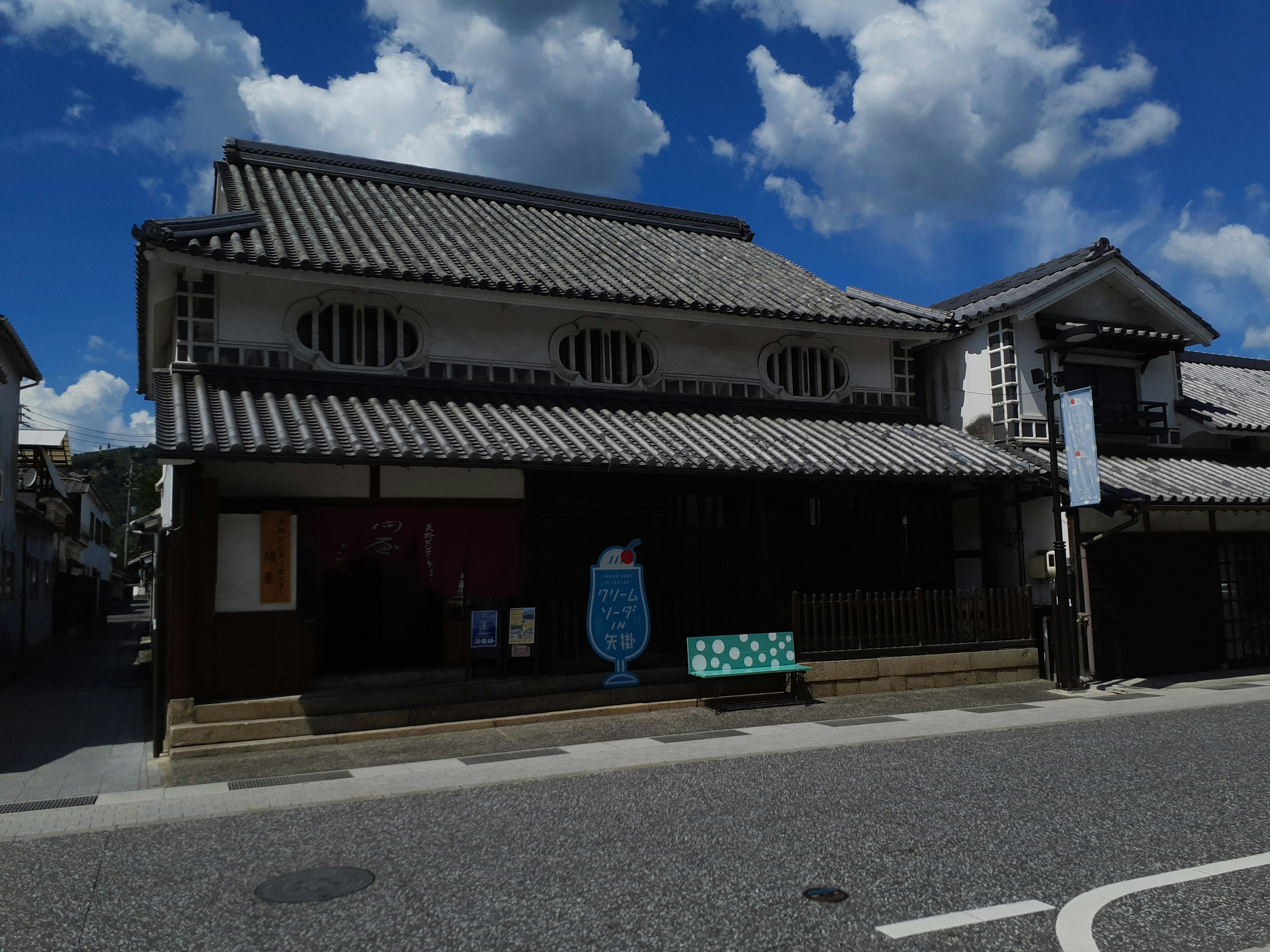 Traditional Japanese building with a tiled roof and blue sky