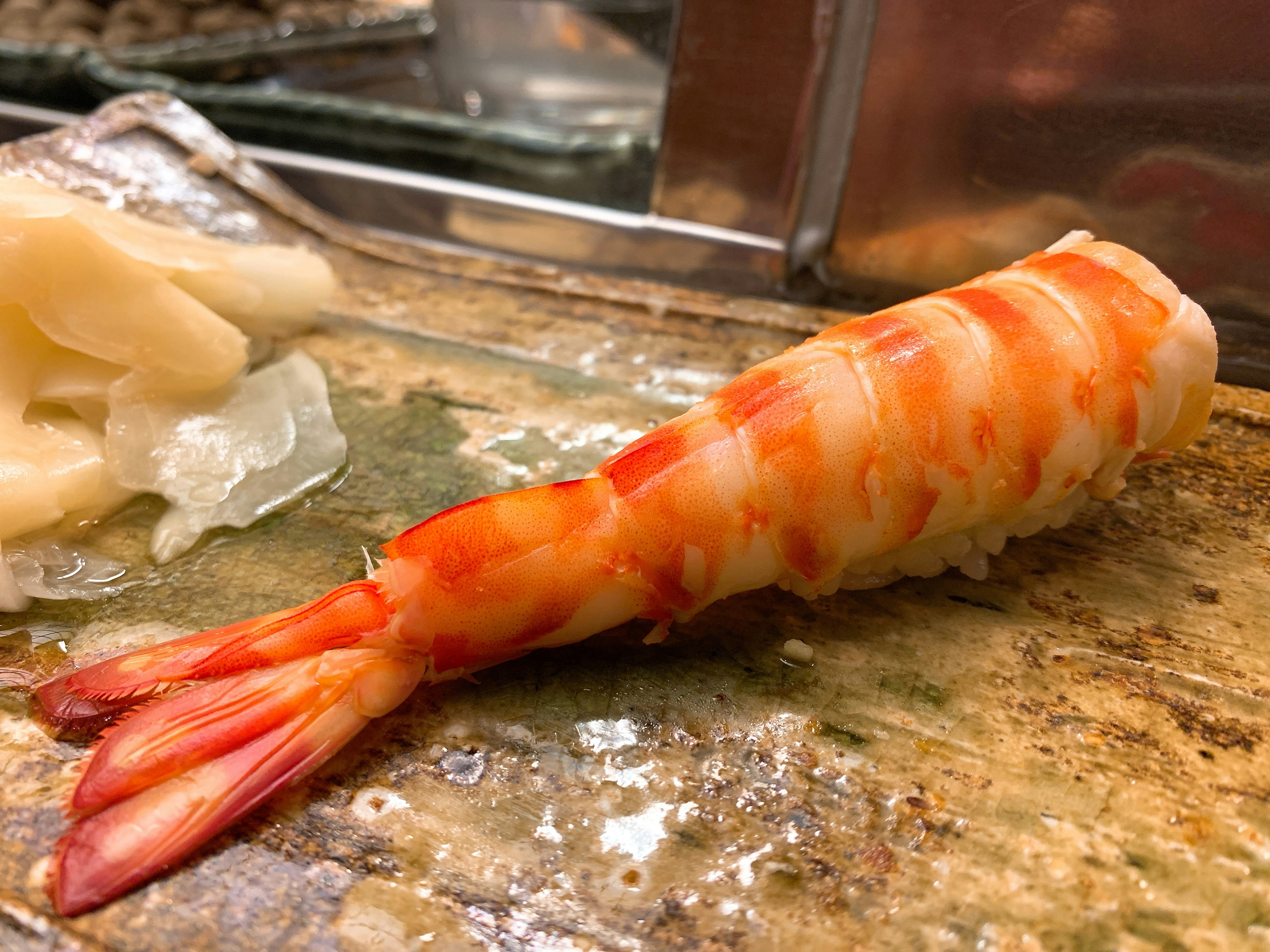 A delicious shrimp sushi placed on a plate