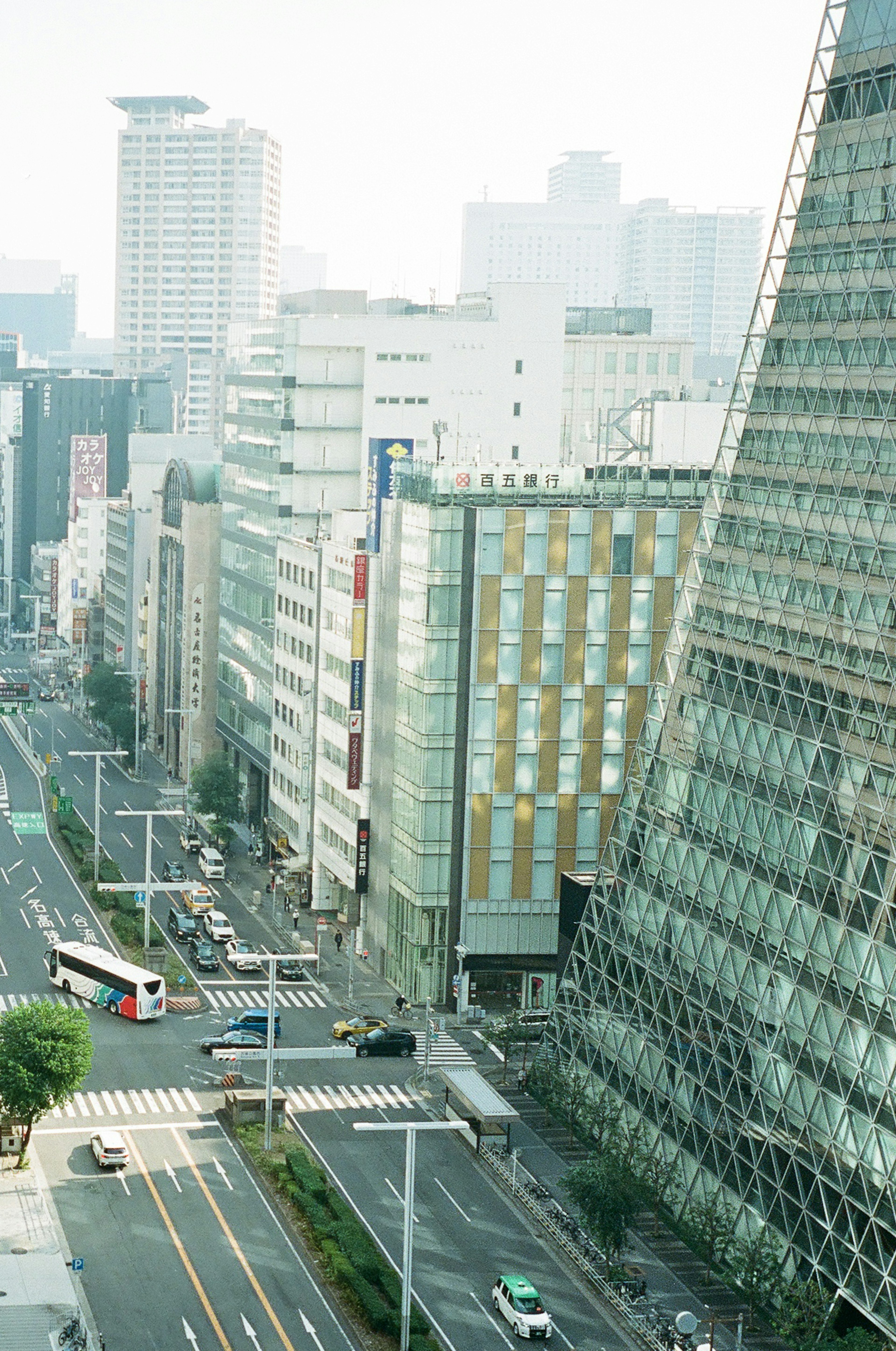 Urban landscape with skyscrapers and visible traffic flow