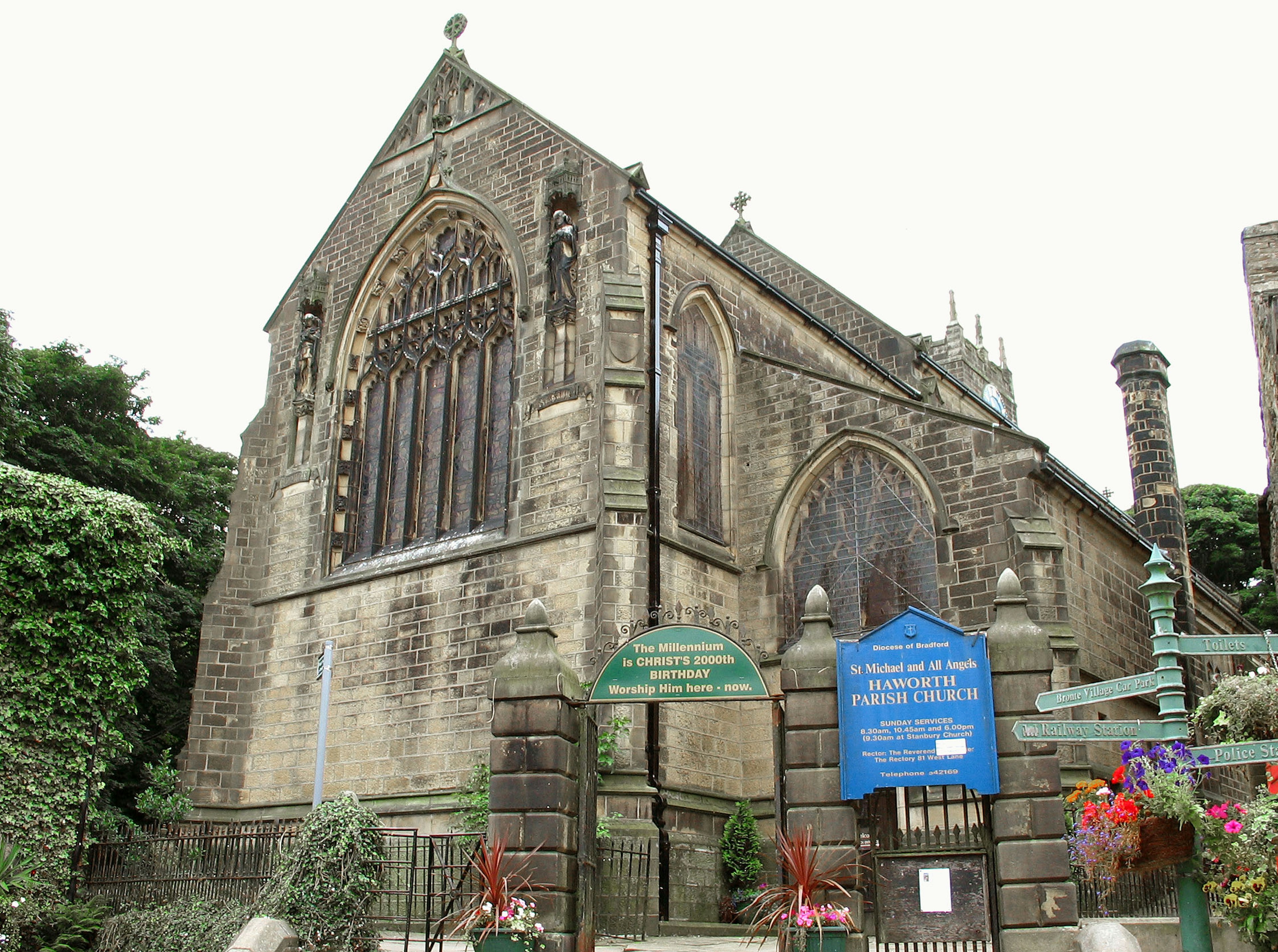 Historic church exterior featuring stone walls and large windows