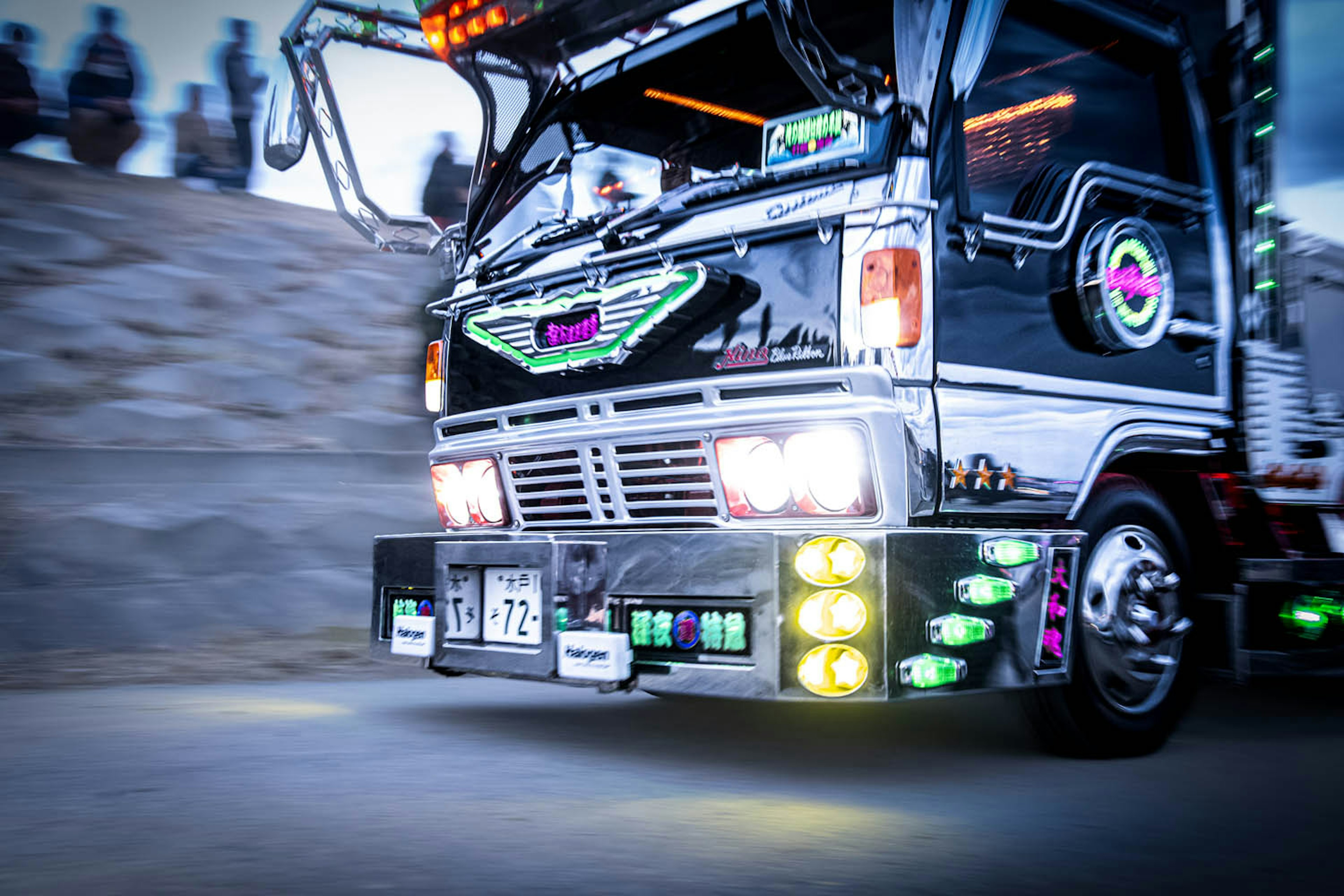 Colorful decorated truck driving on the road