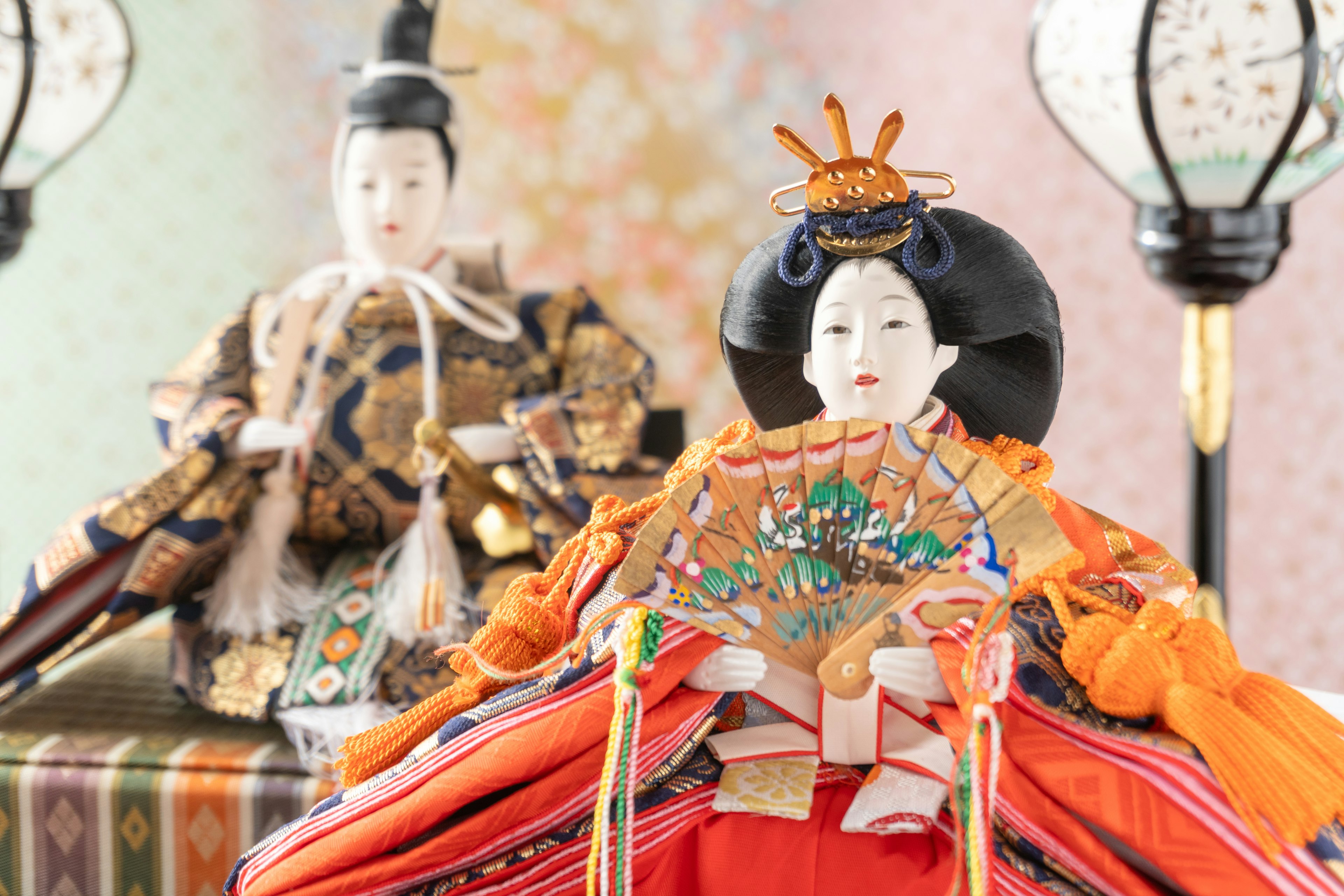 Japanese hina dolls dressed in colorful kimonos displayed beautifully