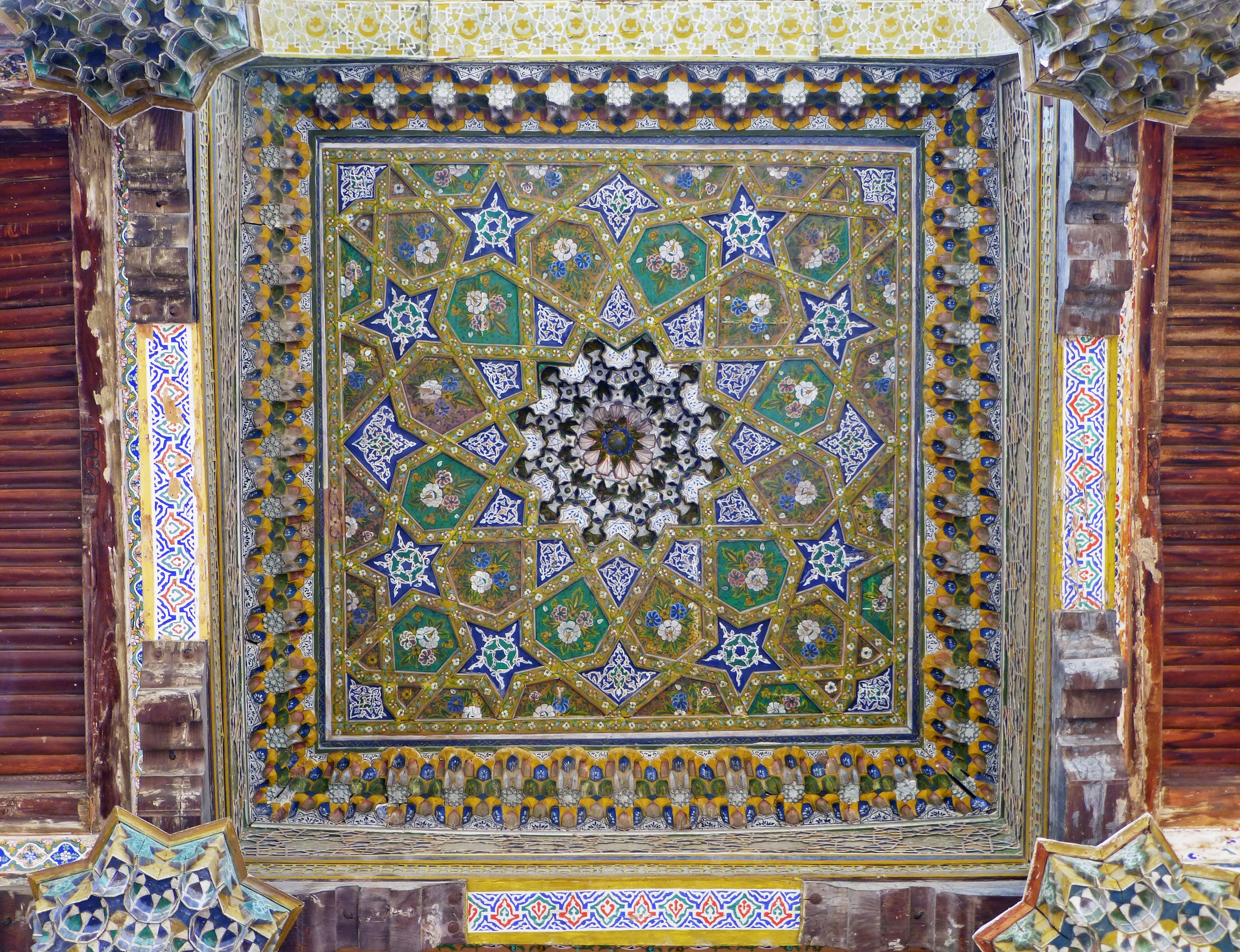 Intricate mosaic ceiling decoration in a historic building