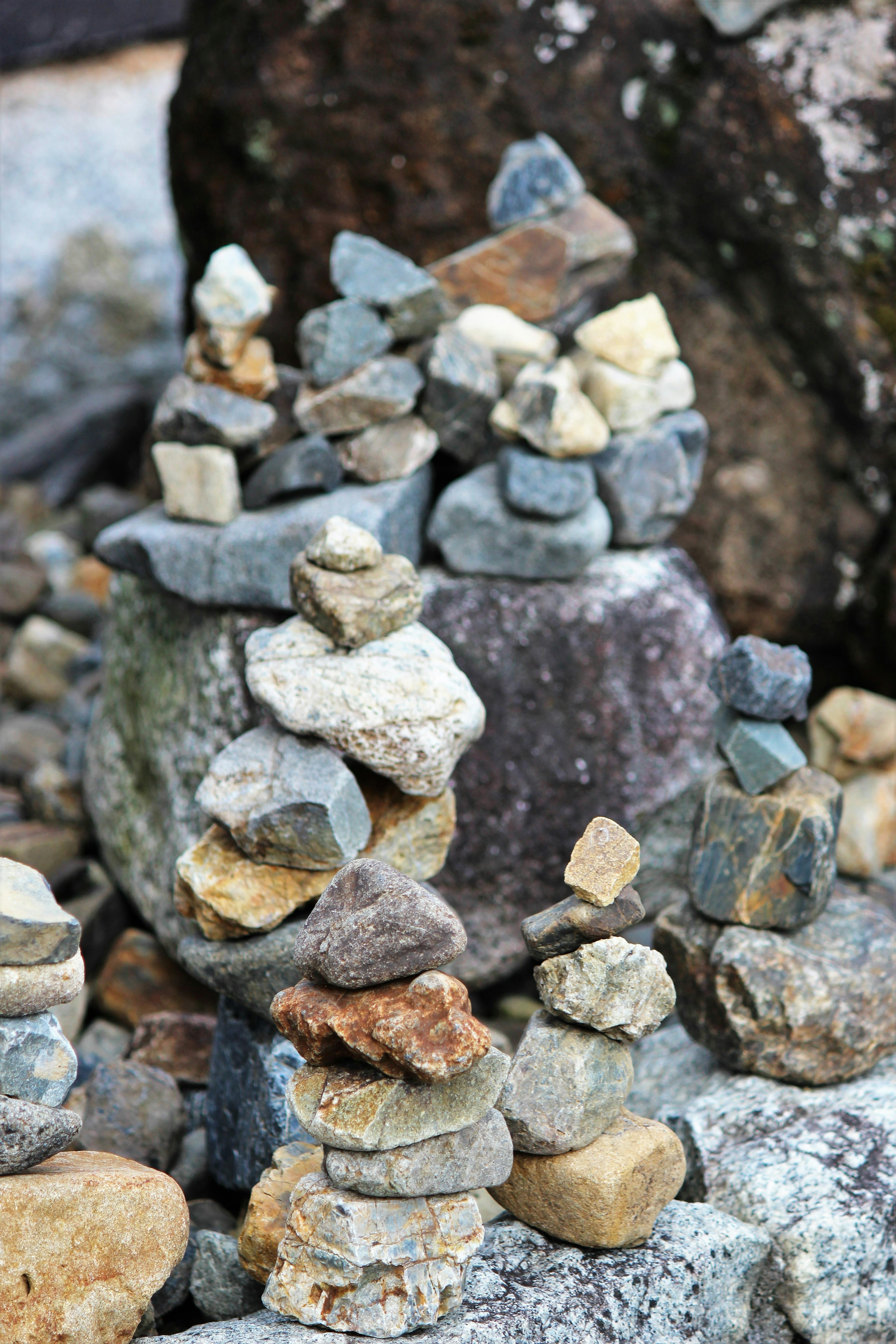 A collection of stacked stones forming small towers or monuments