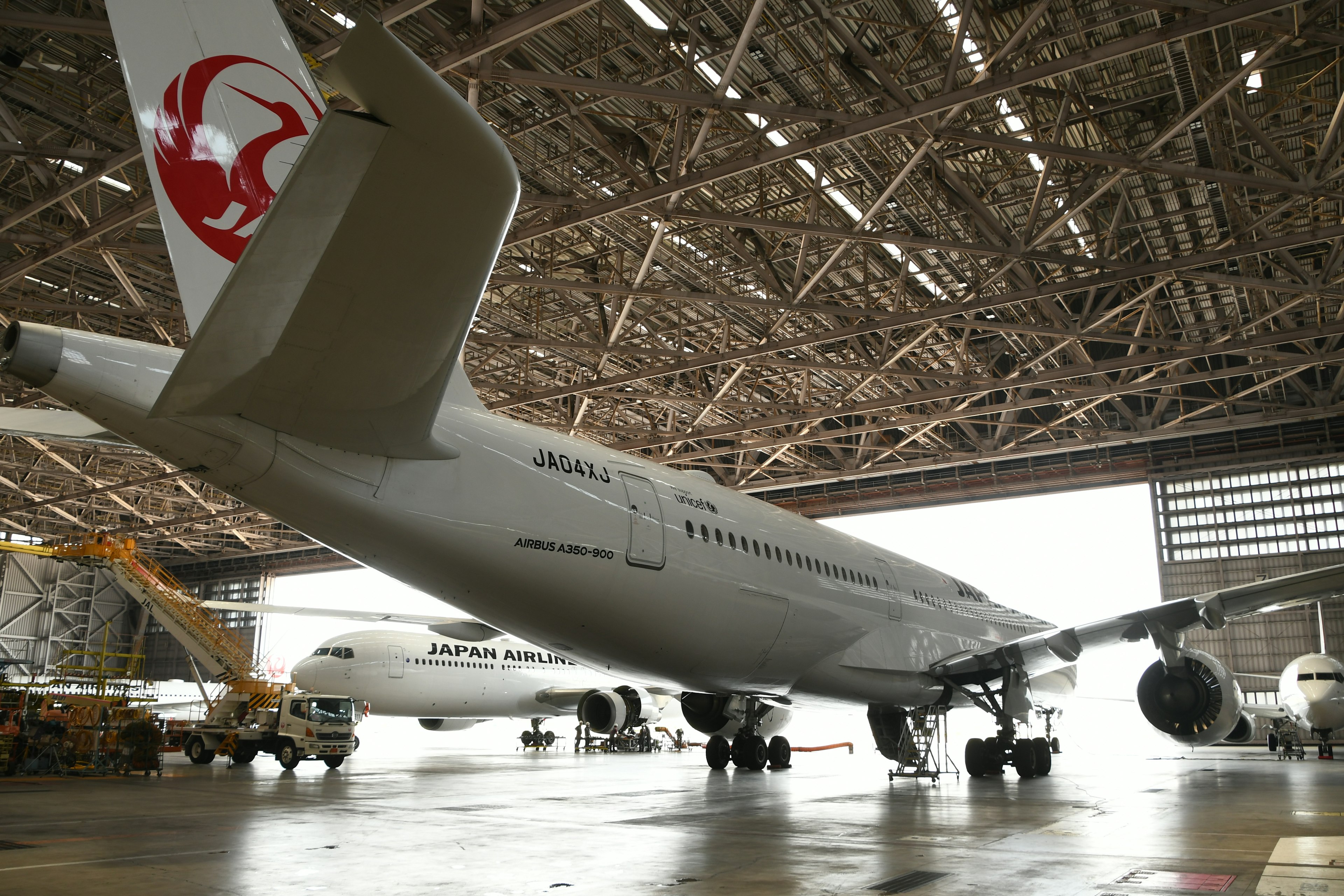 Airplane inside a hangar showcasing its design