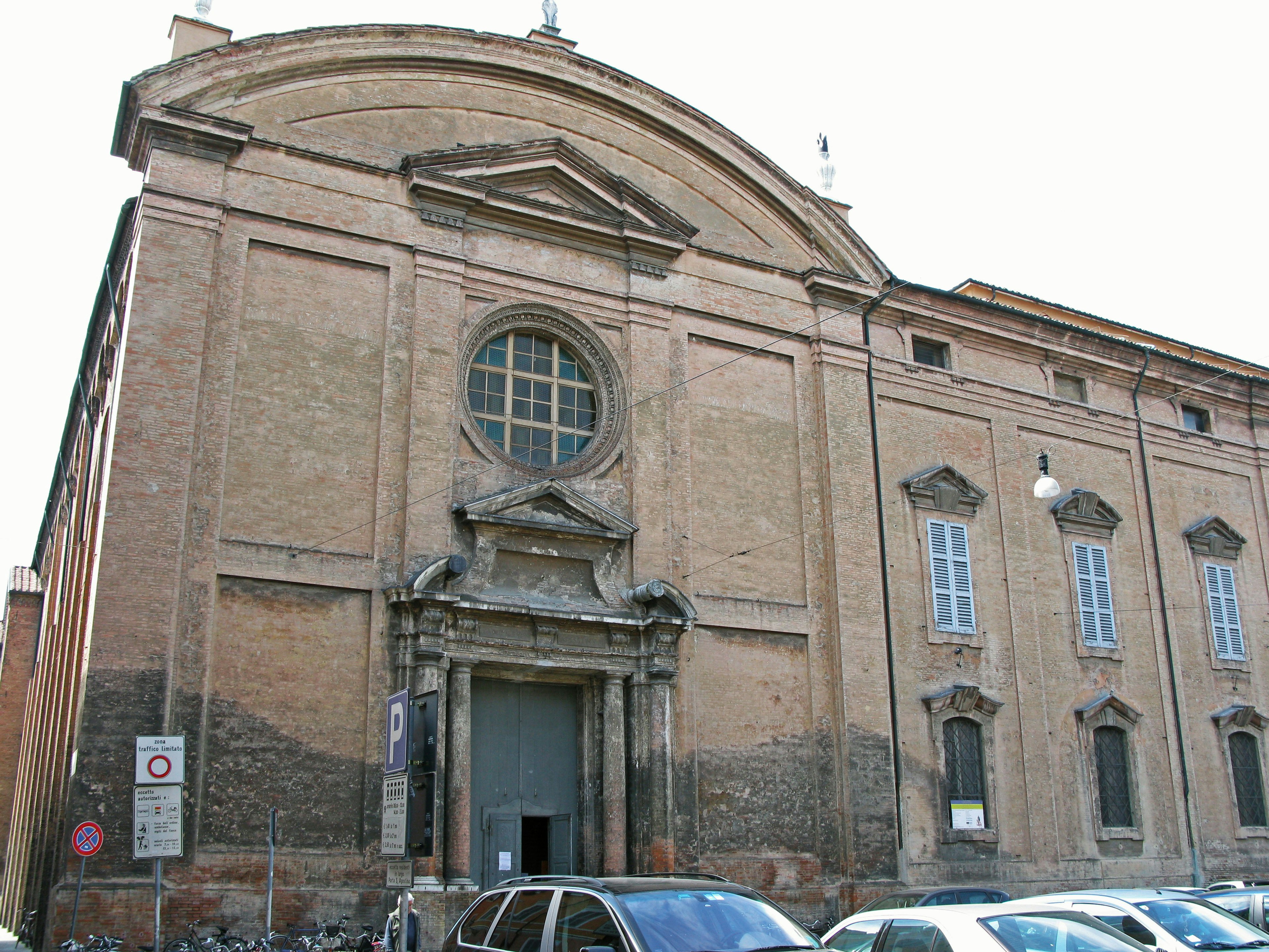 Exterior of an old building with a decorative front entrance