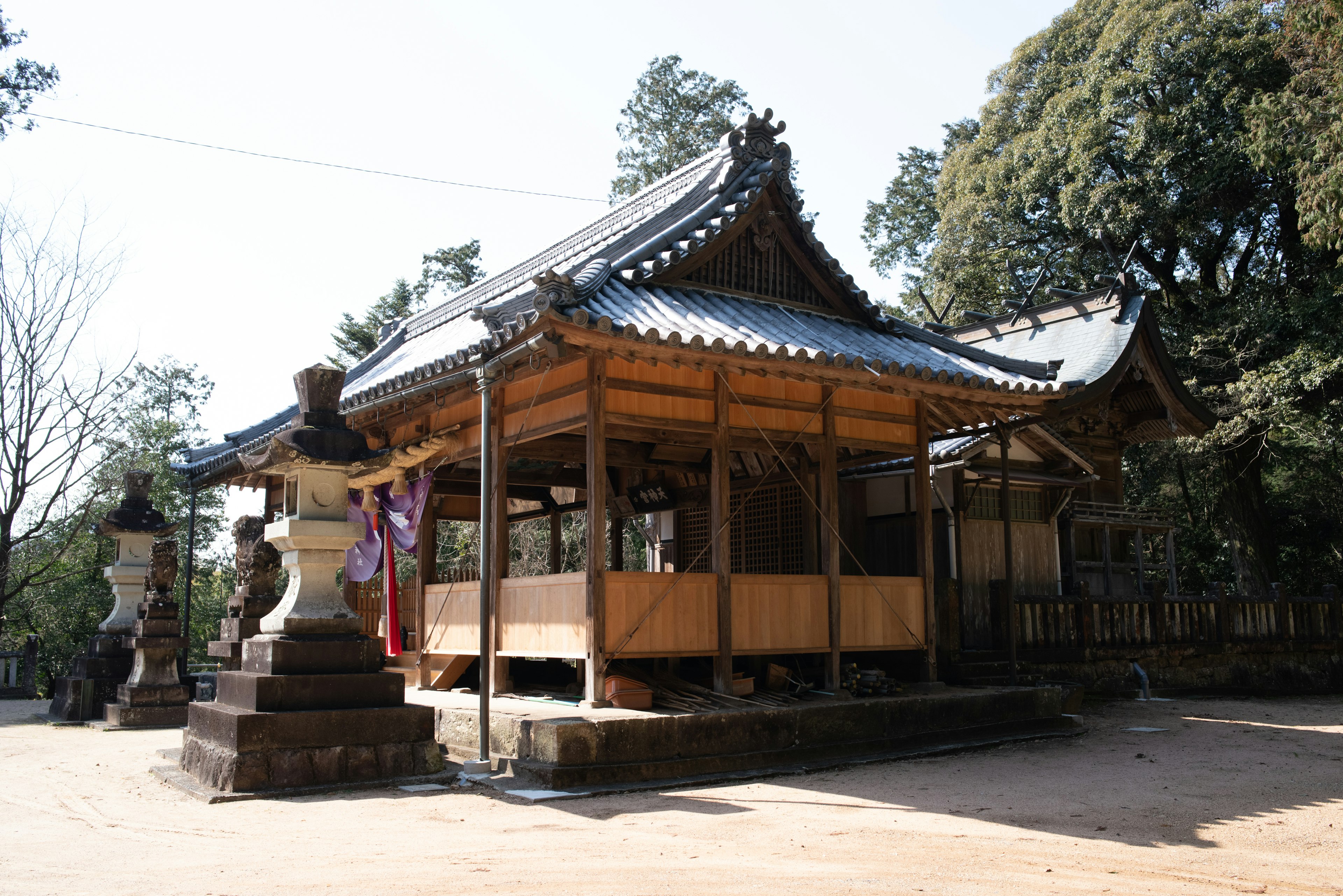 Traditional Japanese wooden temple architecture with a beautiful roof