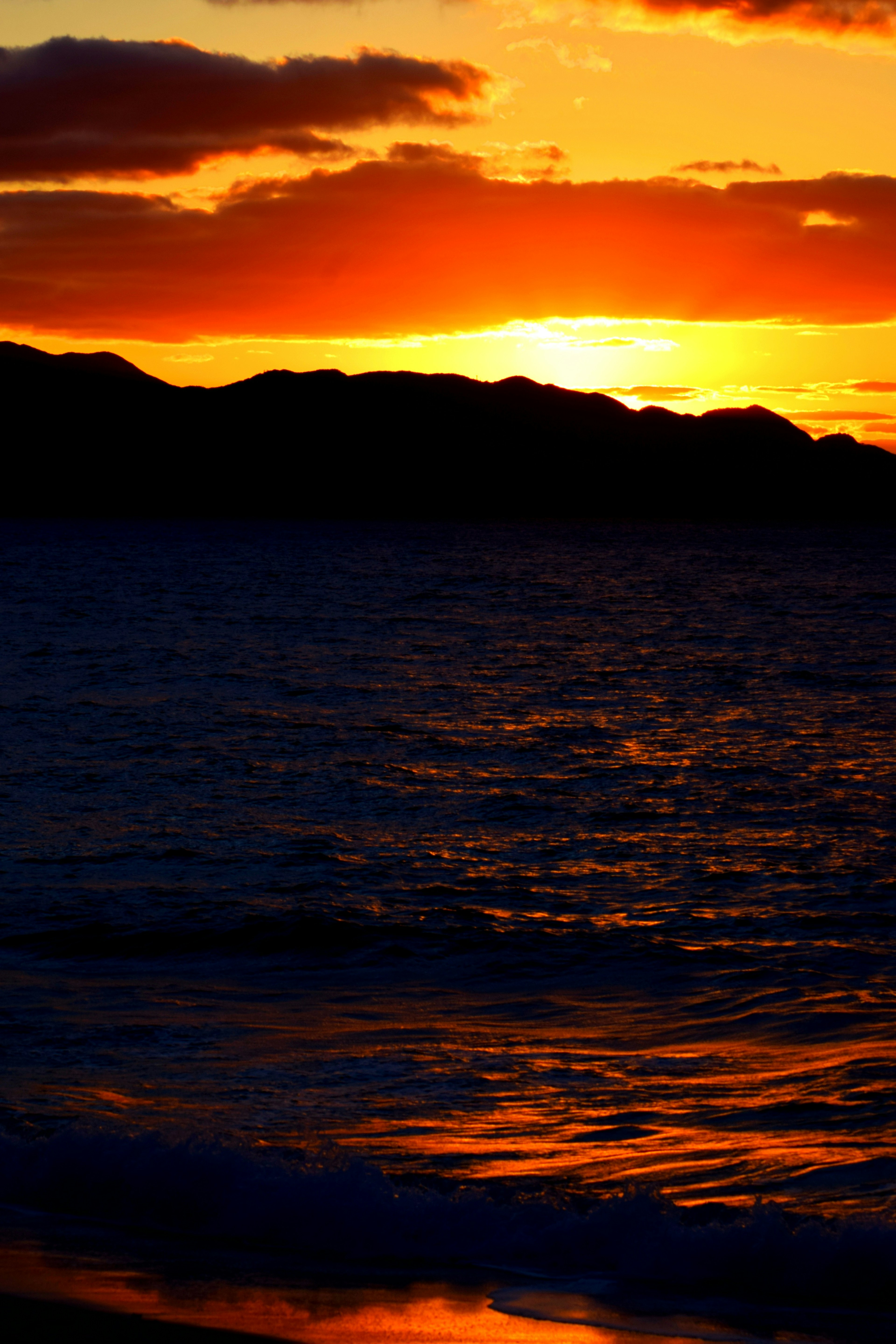 Stunning landscape with sunset reflecting on the ocean